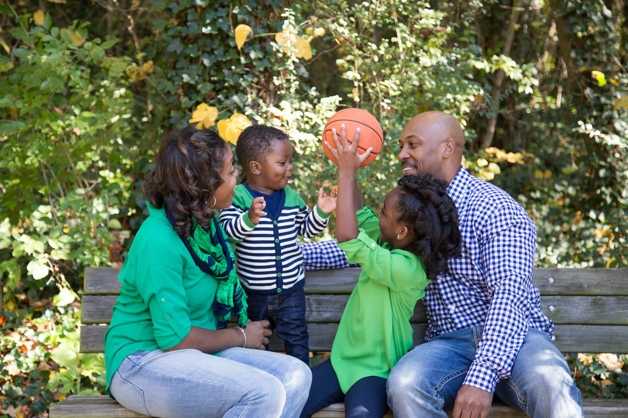 The stars of this show...are the guys! Dad and little bro chose to wear patterns, while mom and big sis coordinated in green. Mom has also added a scarf with texture. They complement each other perfectly! Photo By Nikia Williams