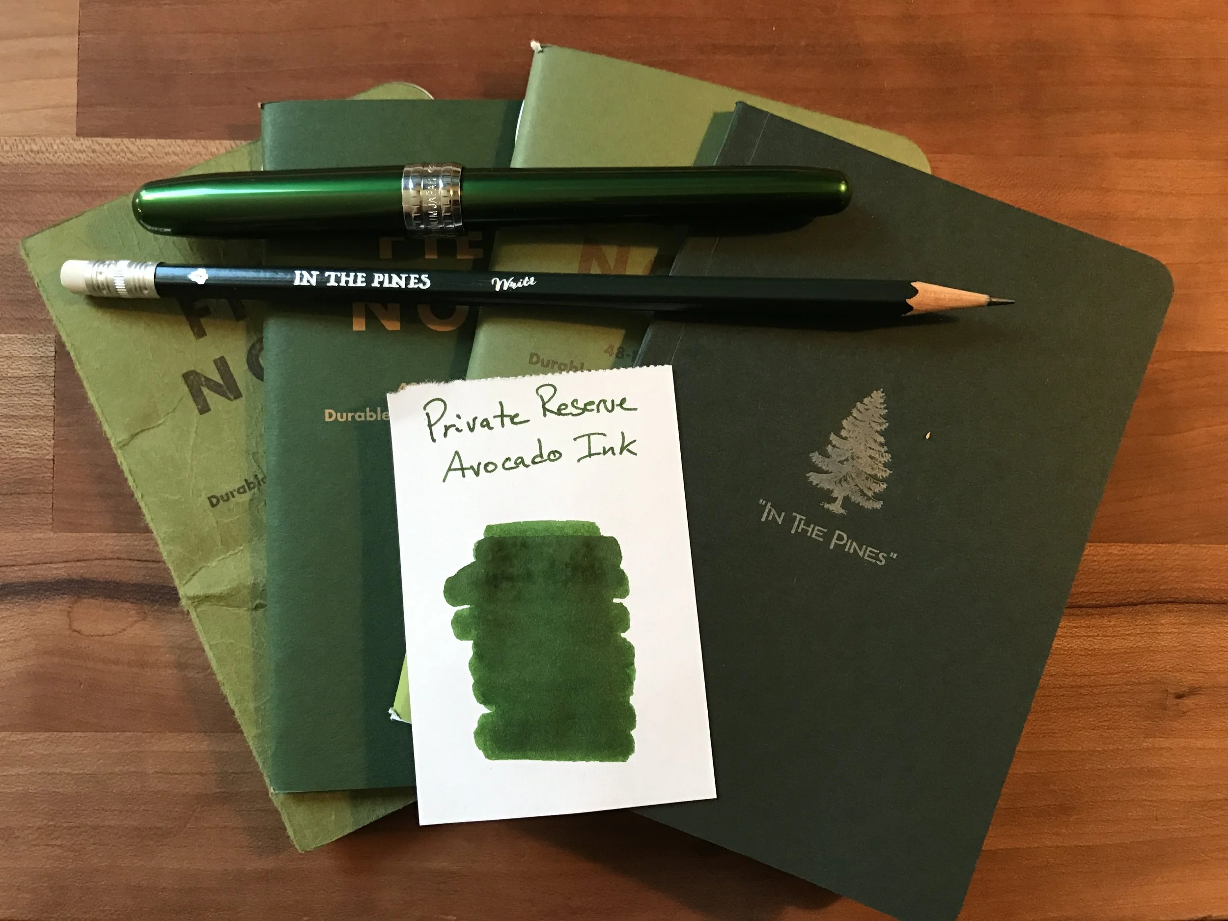 All the dark greens! The Carhartt is actually more dark green, but the way the books are stacked, you can only see the light green part.