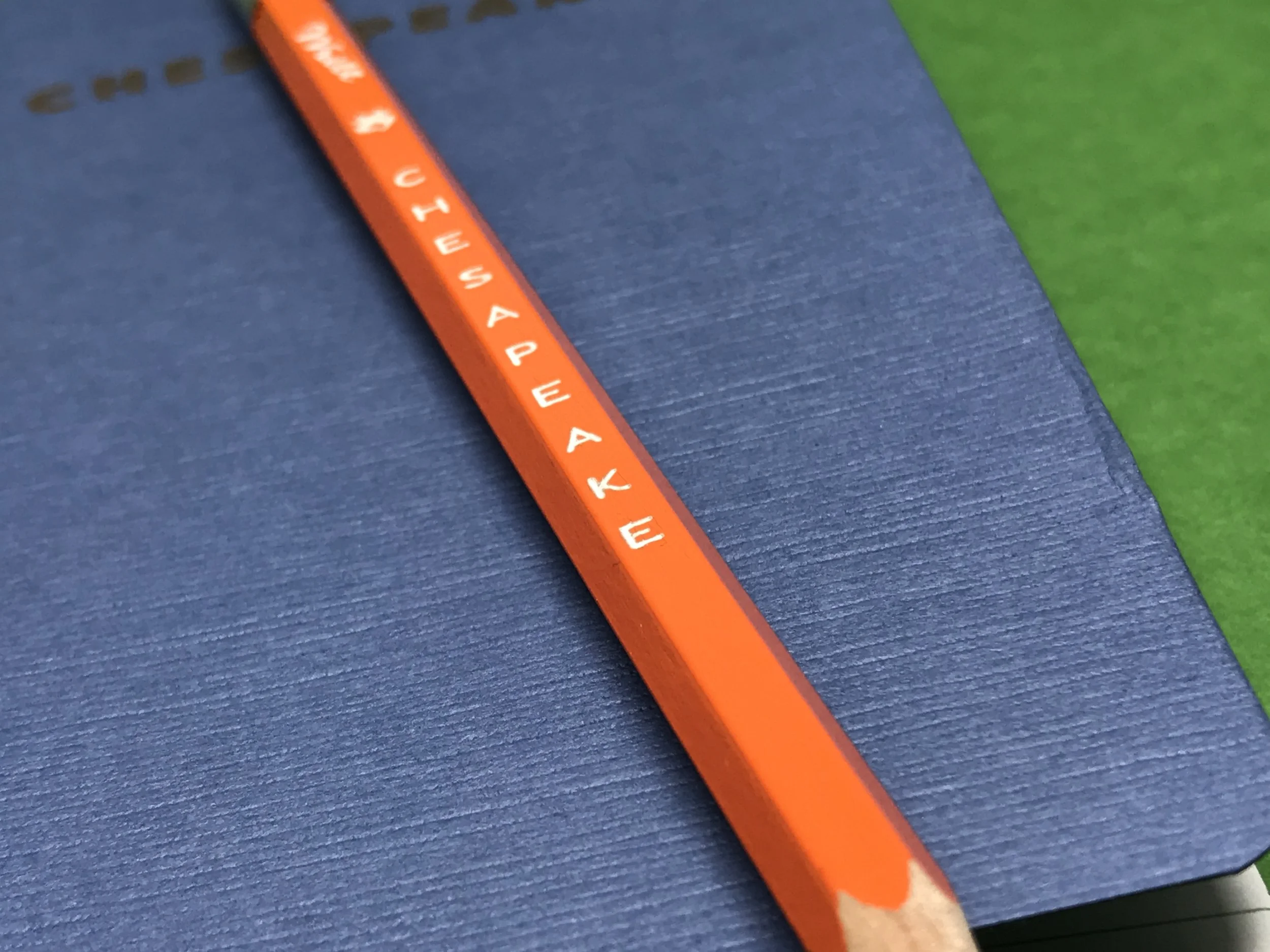 Orange pencil, the color of Old Bay-stained fingers.