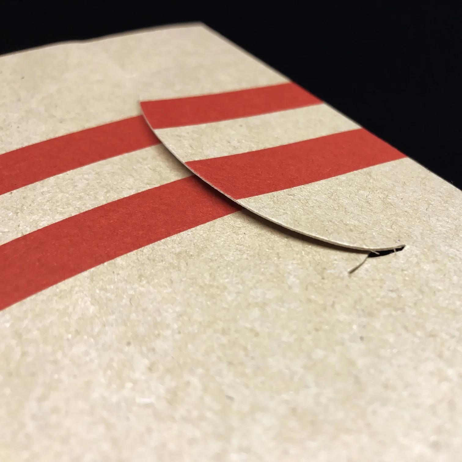 Box flap. Same material as the cover.
