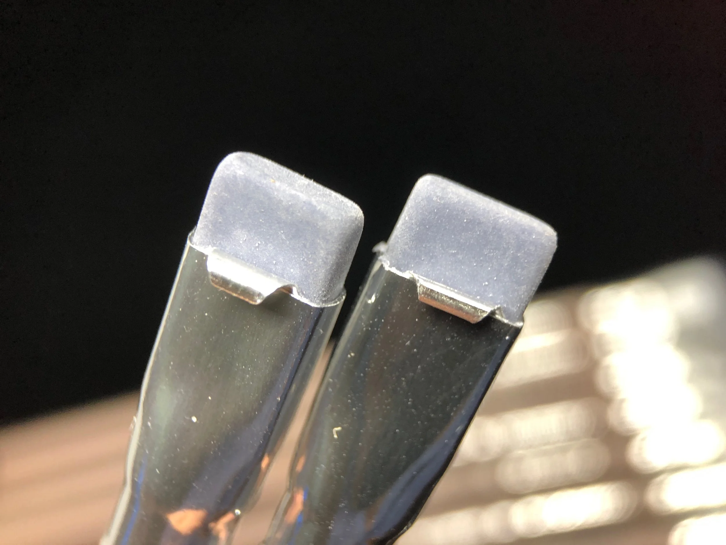 Dusty blue erasers, like Clark's favorite shirt, apparently.