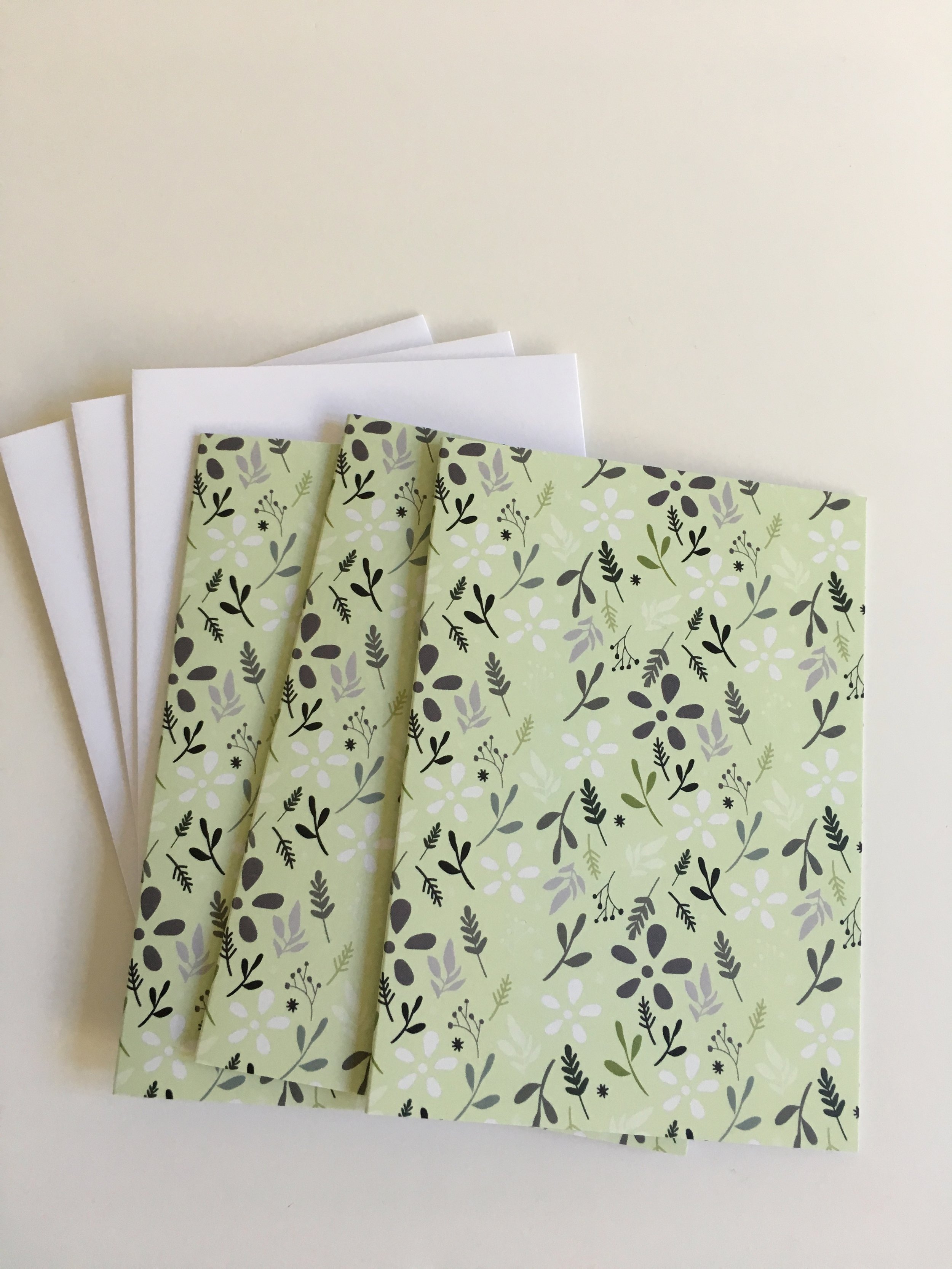 Light green tossed floral patterned cards (Copy)