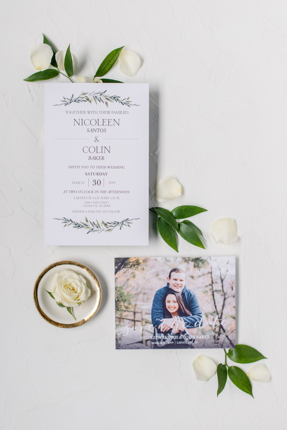 invitation styled with greens and roses.jpg