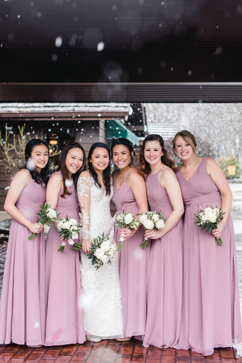 Bridesmaids with snow Lafayette Country Club.jpg