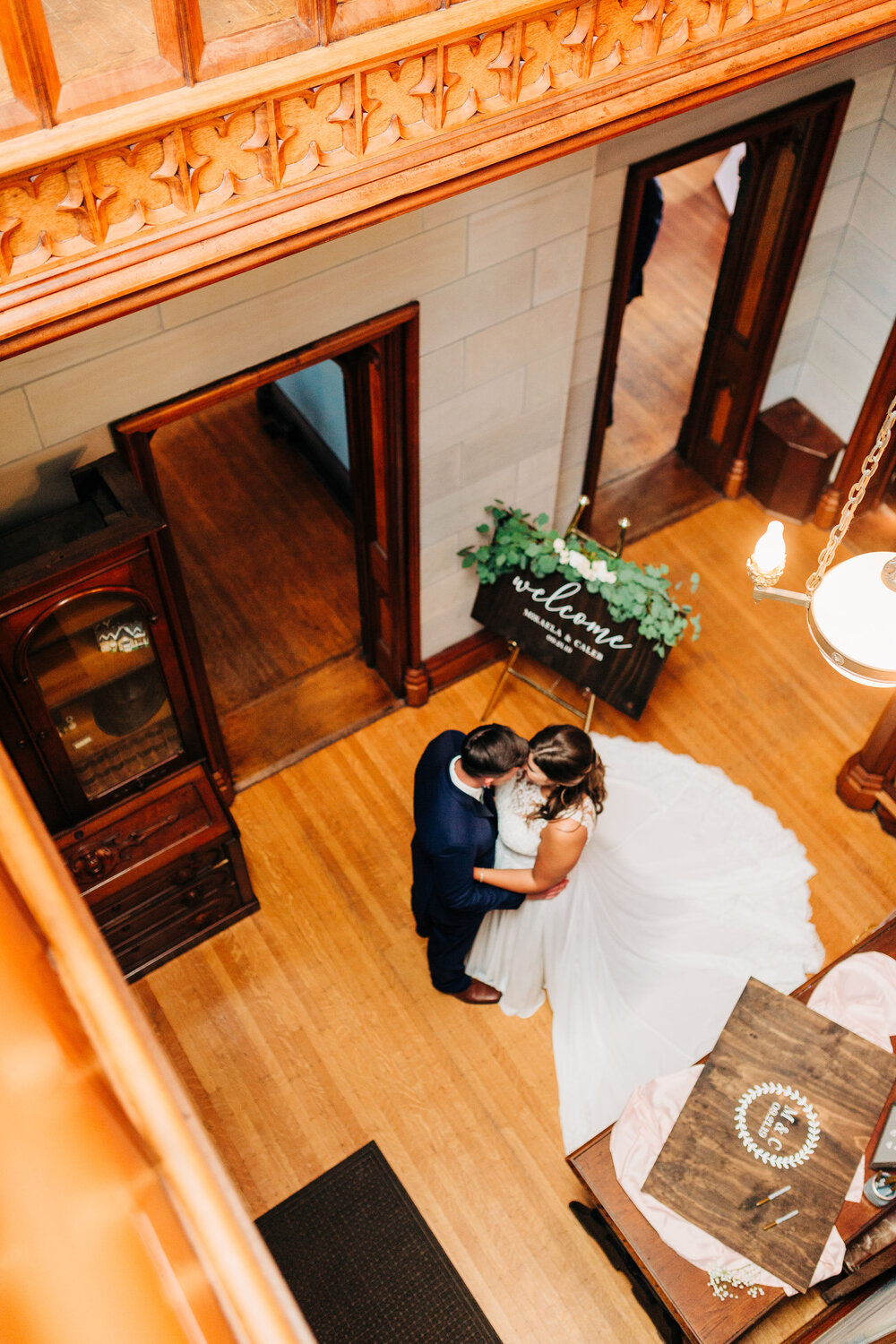 Fowler House Staircase welcome sign bride and groom.jpg
