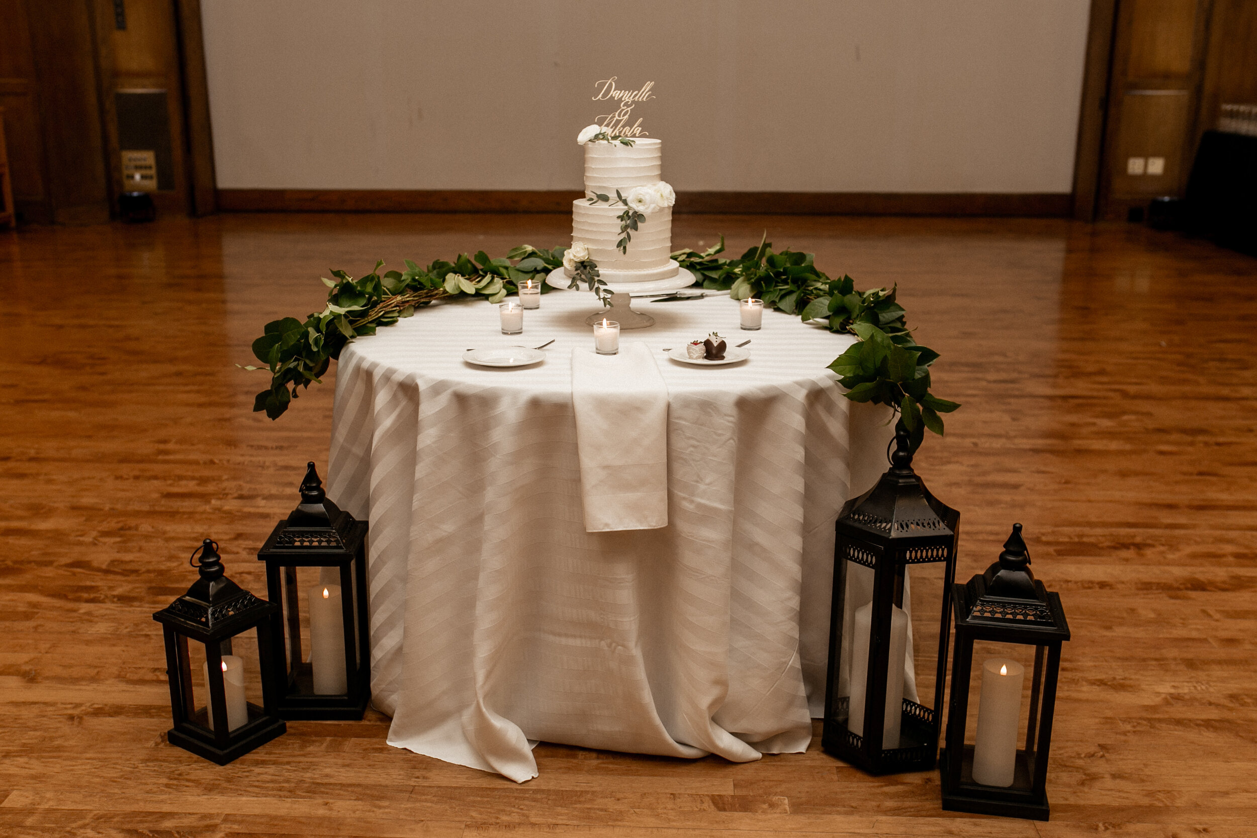 cake table with greenery.jpg