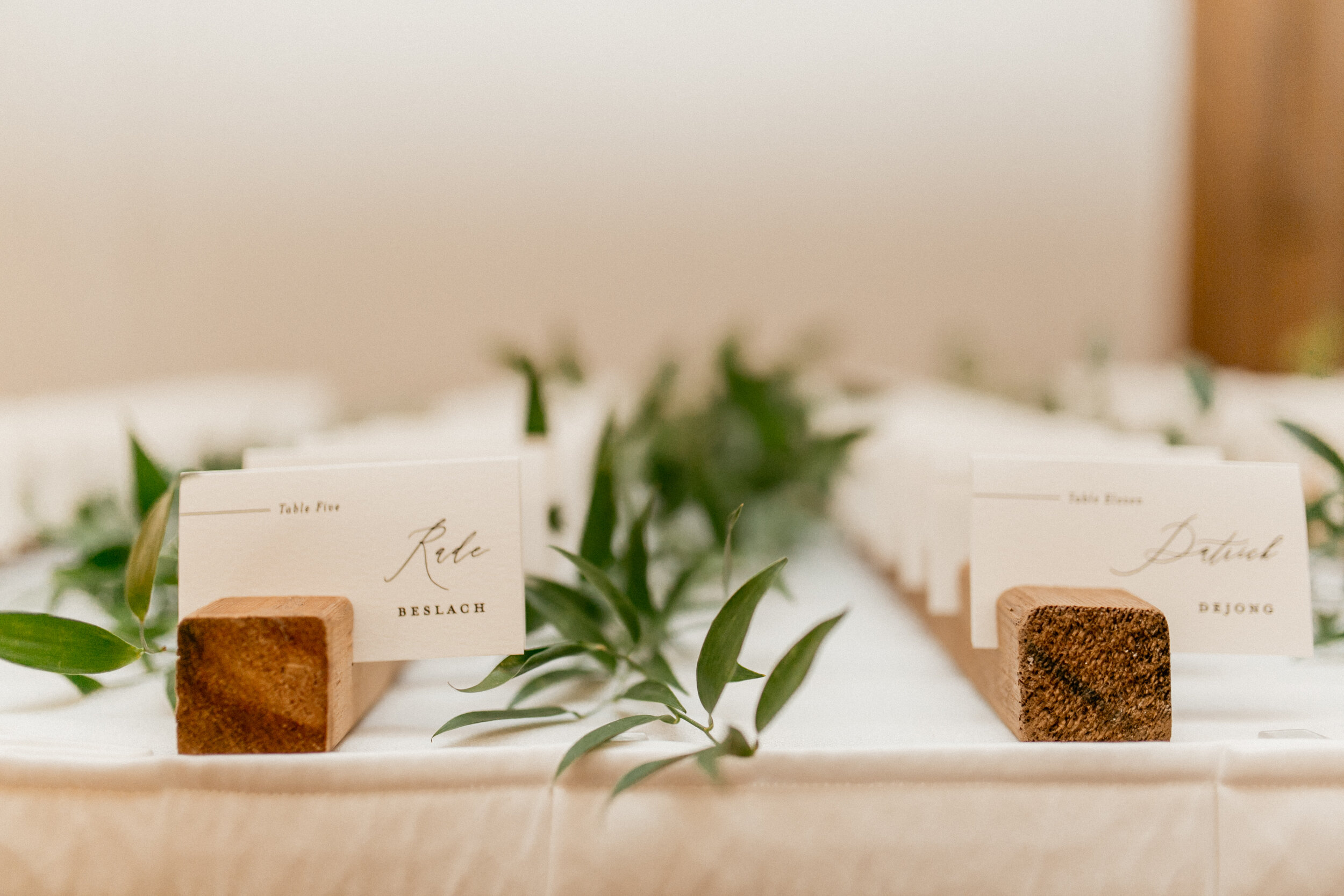 wedding escort table with greenery.jpg