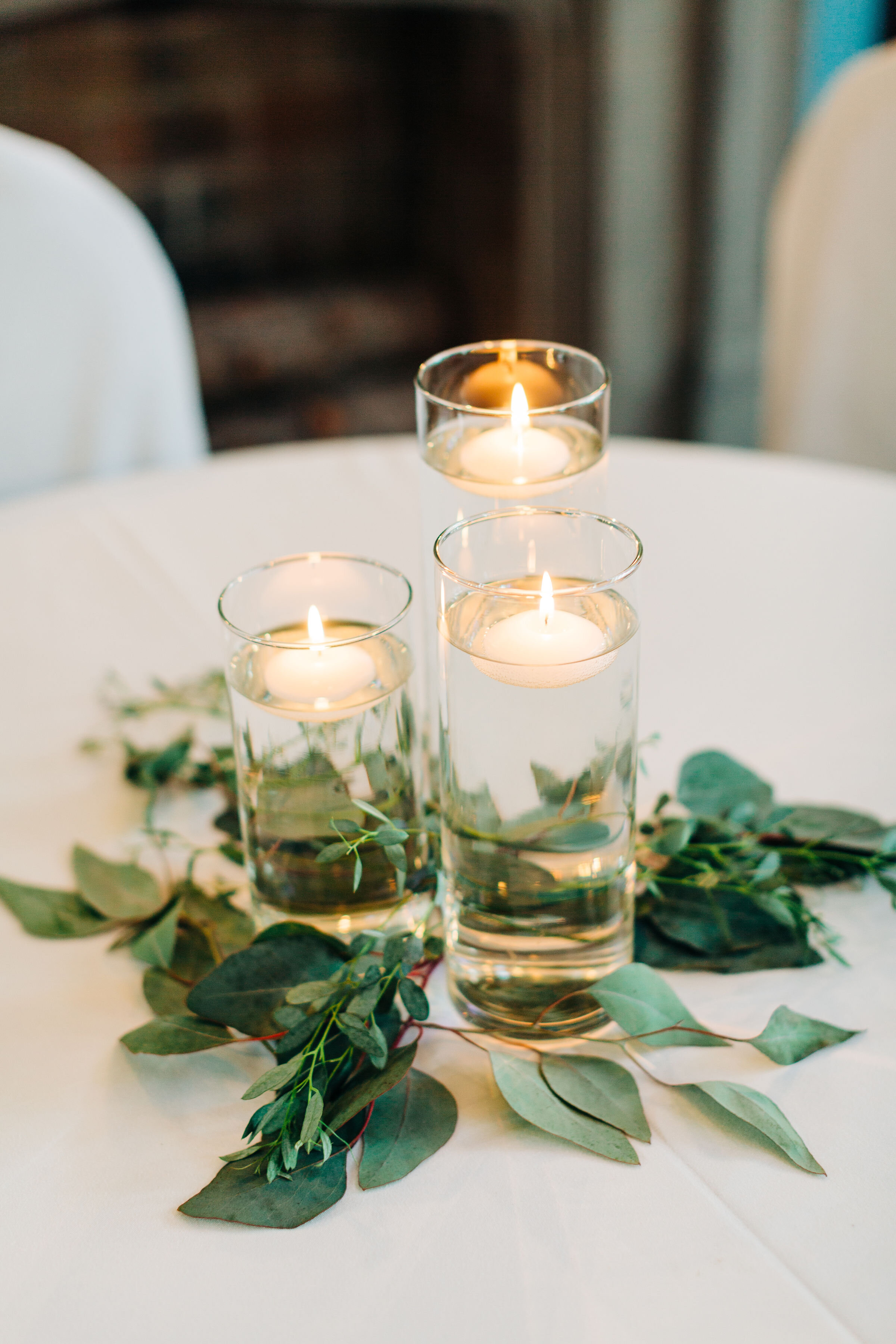 floating candles with greenery.jpg