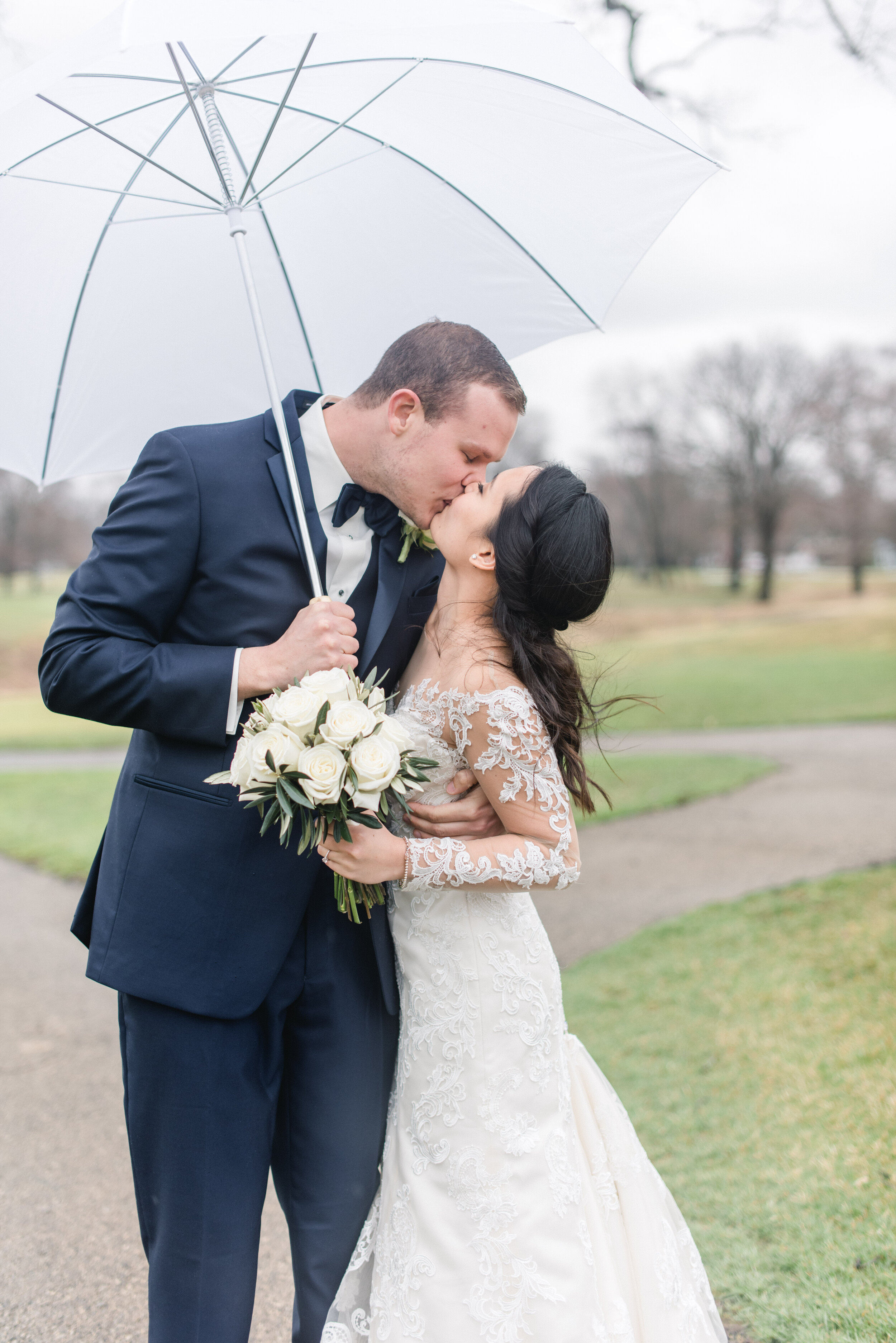 bride and groom umbrella.jpg