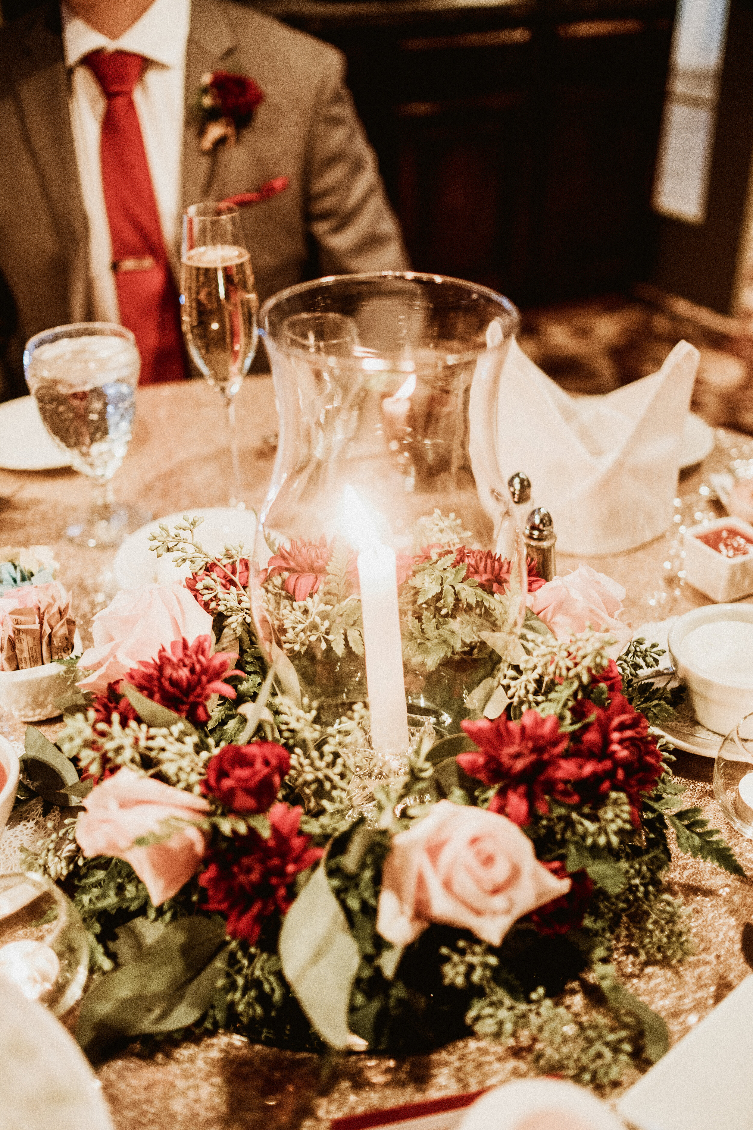 Hurricane centerpiece with floral ring.jpg