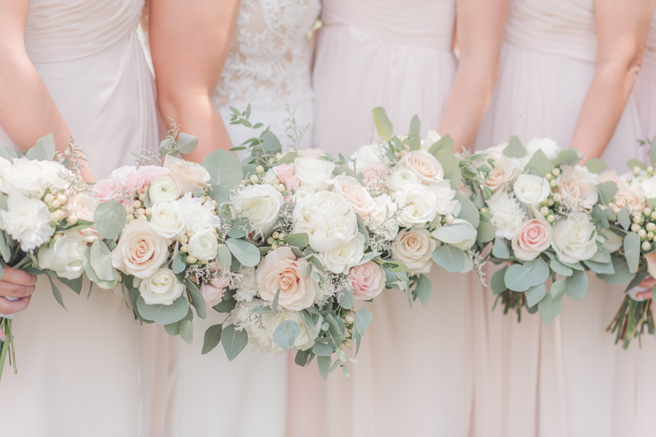 blush and cream bridal and bridesmaid bouquets.jpg