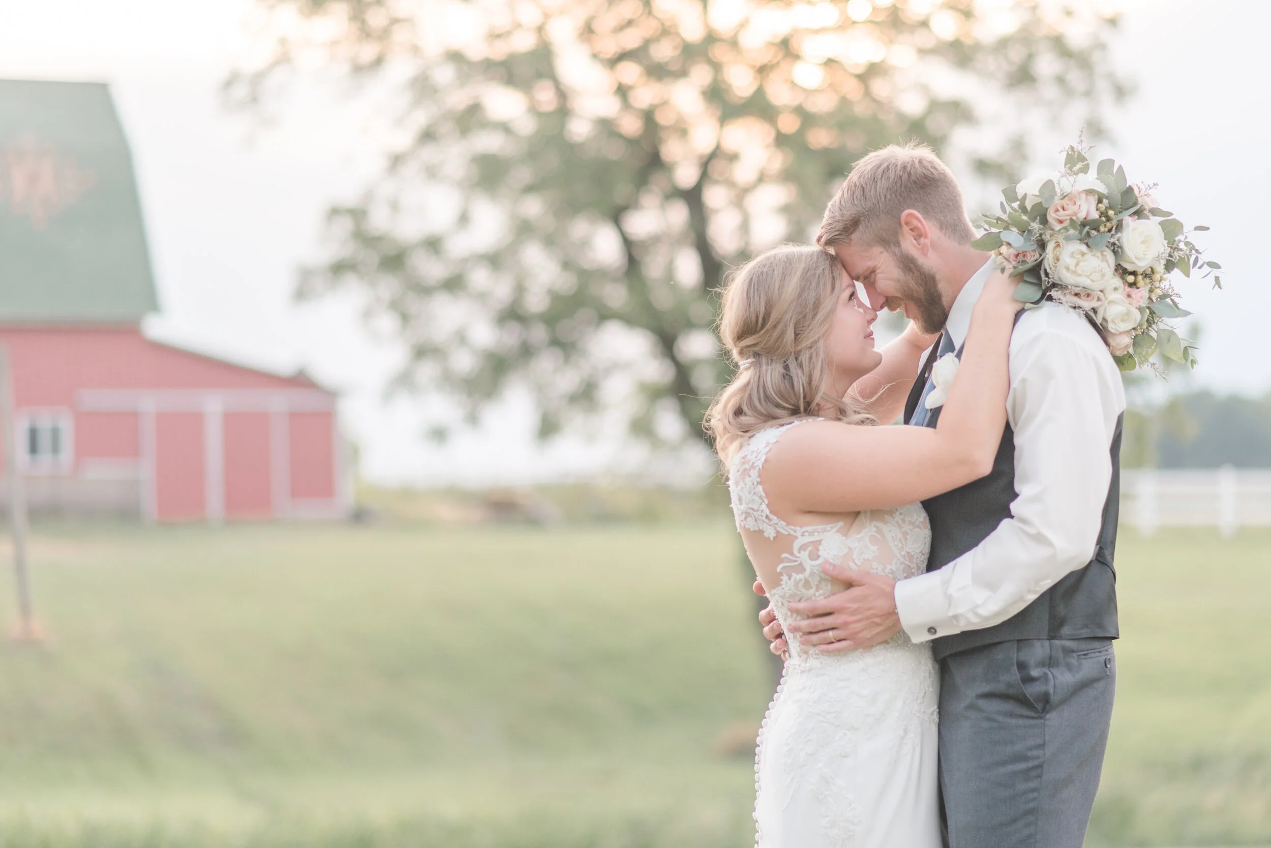 bride and groom red barn bouquet.jpg