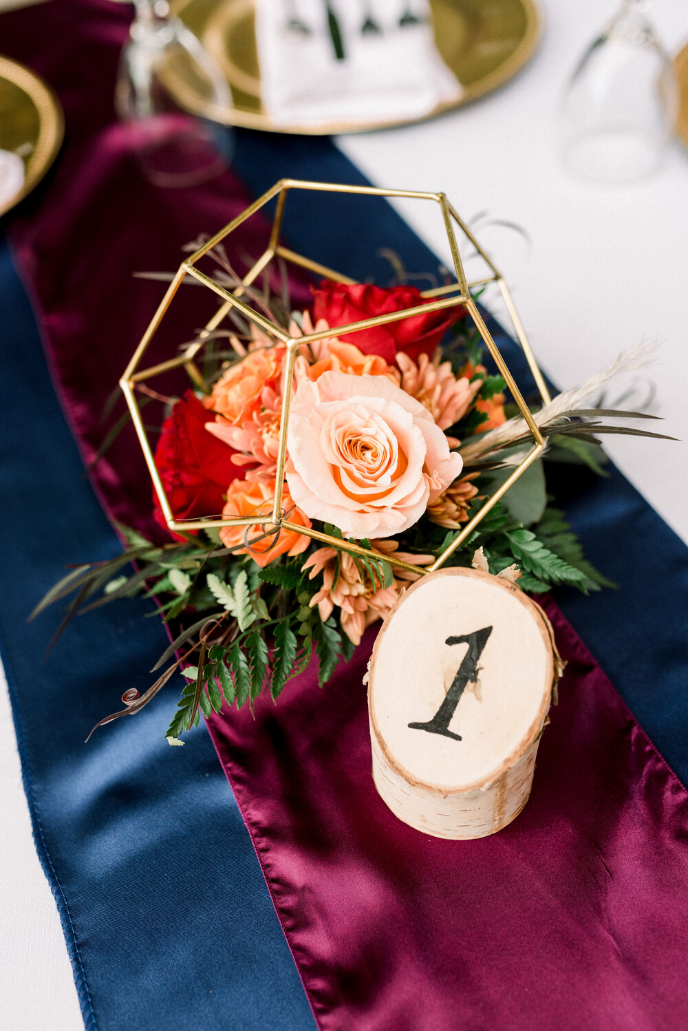 Glassless Geo Centerpiece with Flowers Wedding.jpg