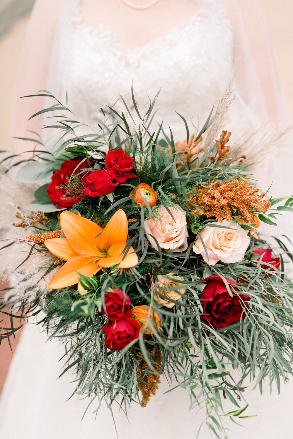 lily, rose, ranunculus, fall wedding bouquet.jpg