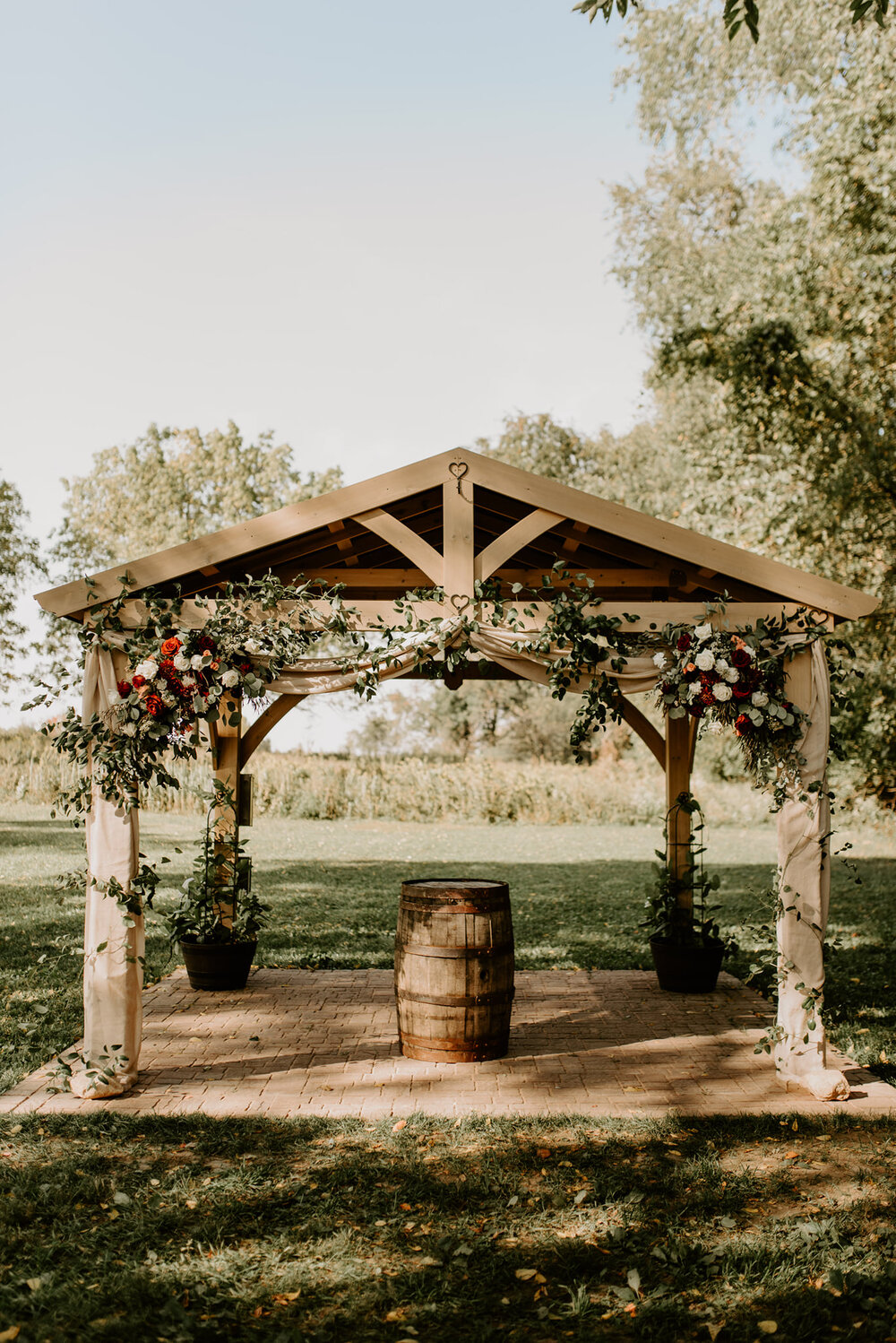 Arbor Flowers With Greenery.jpg