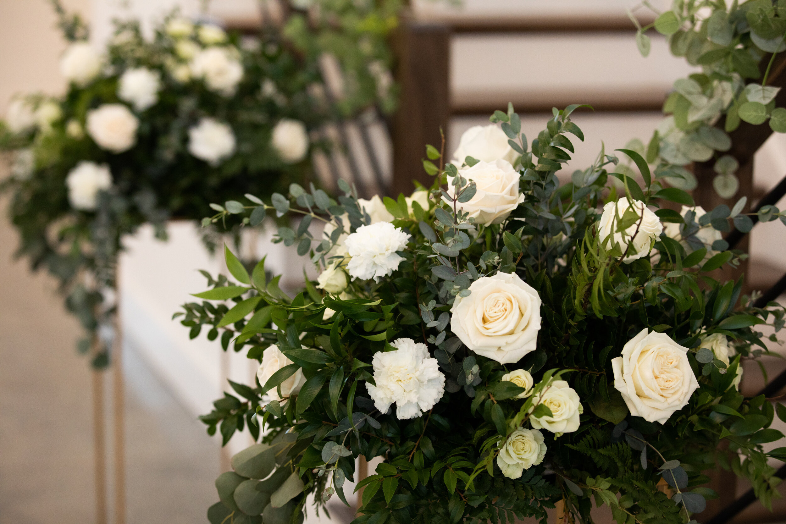 white flowers centerpiece tall.jpeg