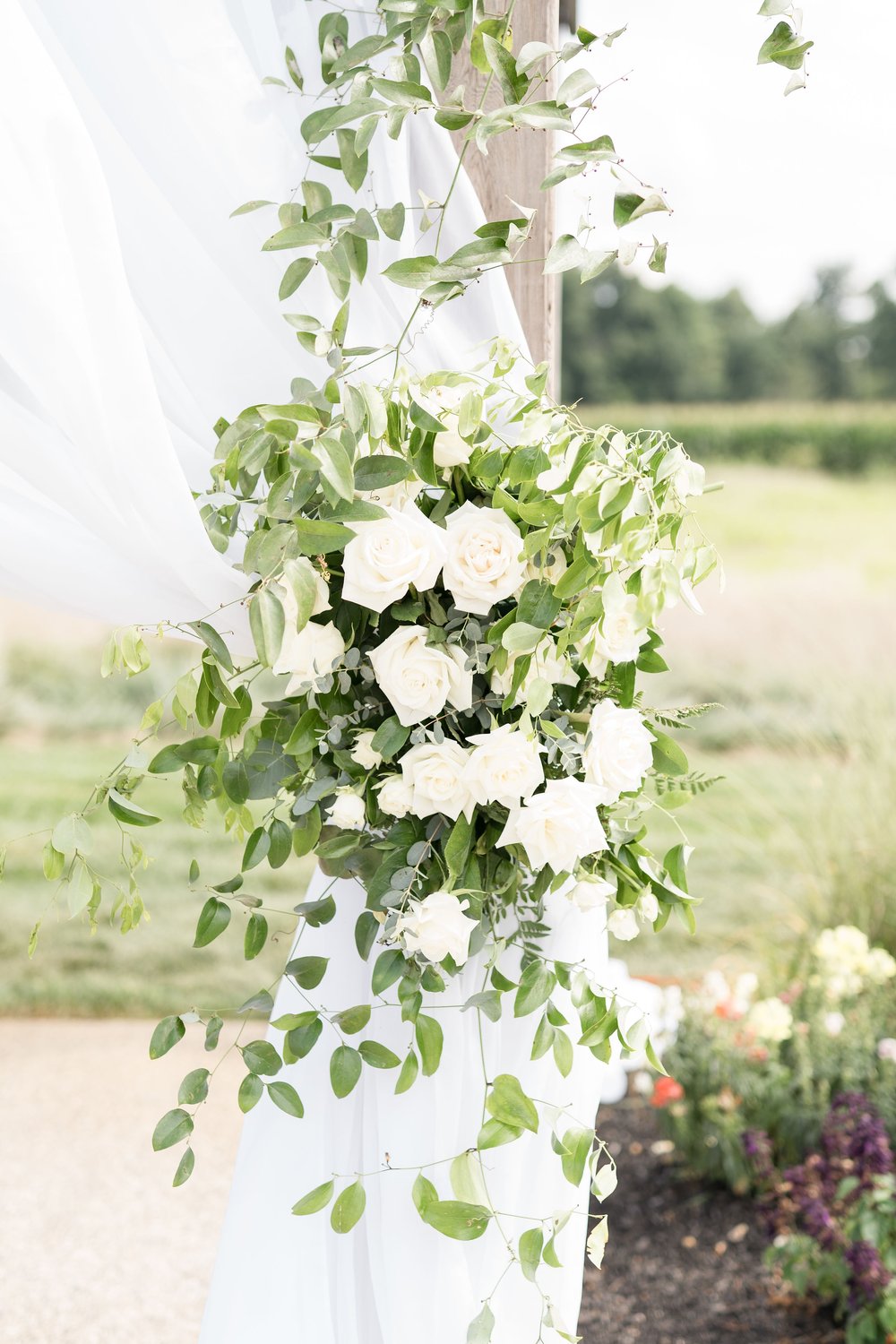 white arbor flowers.jpg