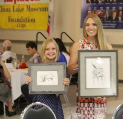 CLMF 2016 Dinner Auction Vanna Whites: Piper Faust and Molly Cummins
