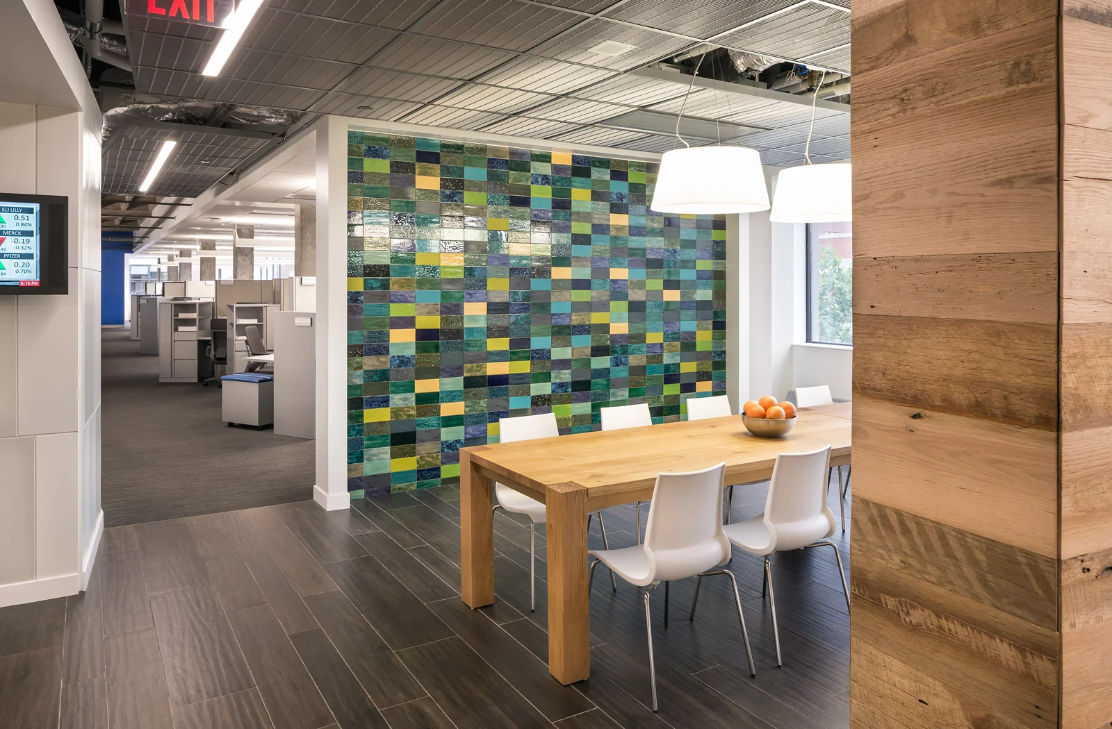 DkGr has been a leader in integrated workplace design in the Indianapolis area and continues that focus for a myriad of clients. By helping create and further enhance this notion of open collaboration, knowledge sharing and Impromptu social Interaction to better serve a mobile workforce, the IWP methodology has become an Invaluable asset to many corporate clients. The absence of closed offices in favor of varying -size meeting spaces, focus booths and open collaborative environments has not only improved productivity amongst its employees, but has also saved on real estate resources. The below-referenced project was designed for a research and development department of approximately 150 people within a large confidential corporate client In Indianapolis, IN. Besides the large conference rooms, smaller enclaves and open meeting environments, the space has ample resource centers for print, supplies and mail needs as well as open social hubs that serves as the "nerve center" for informal gathering. PROJECT DATA CLIENT: LOCAL CORPORATE CLIENT COMPLETION: 2014 PROJECT AREA: 50,000 SF PROJECT BUDGET: $13M LOCATION: INDIANAPOLIS, INDIANA