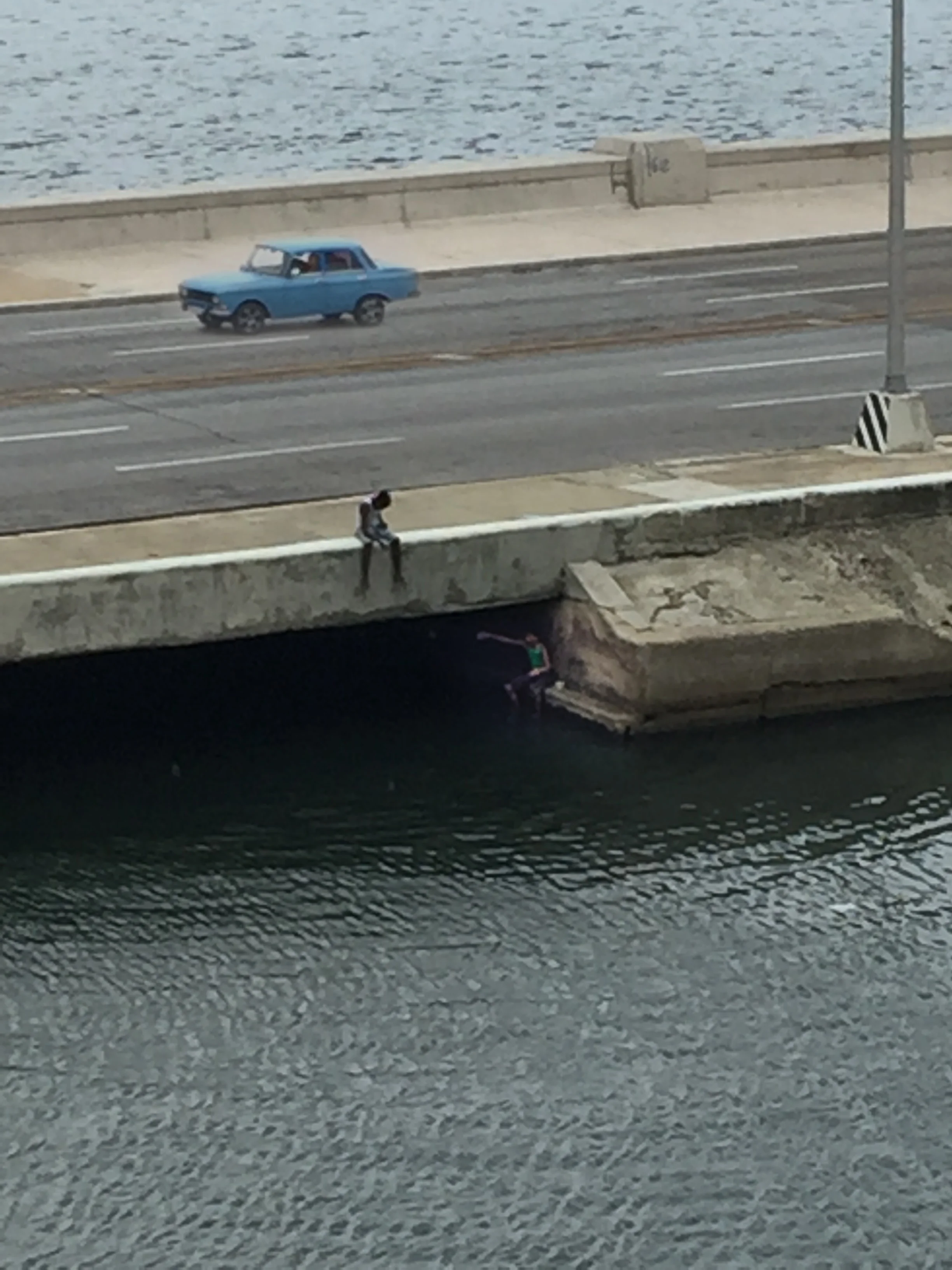 Fishing under the Malecon
