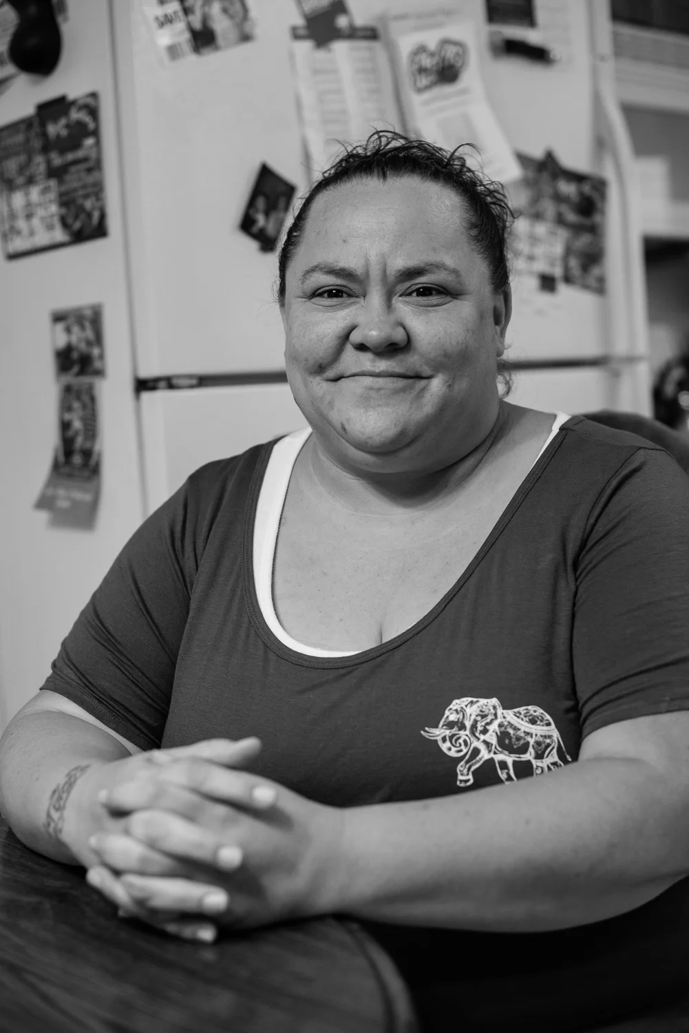 Maria in her kitchen after our interview. Maria now serves as Director of Case Management for a local social services agency. "I learned that we had to work. We had to do our part and be a productive member of society."