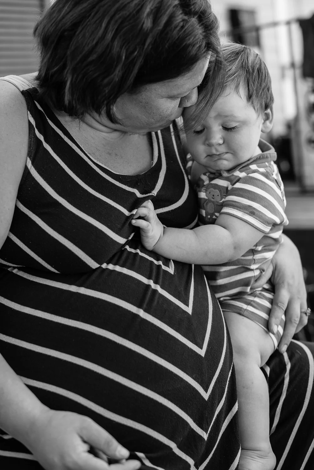 Sabrina, almost 8-months pregnant, with her son Iain on the day of our interview. 
