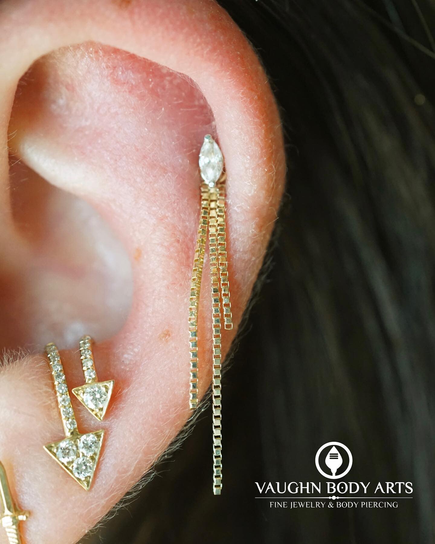 Our wonderful client Bea stopped by the other day and we got to add some new gorgeousness to her ears. 

For her existing helix piercing we put on this &ldquo;Alexas&rdquo; from BVLA. Three yellow gold box chains in three different lengths. How amazi