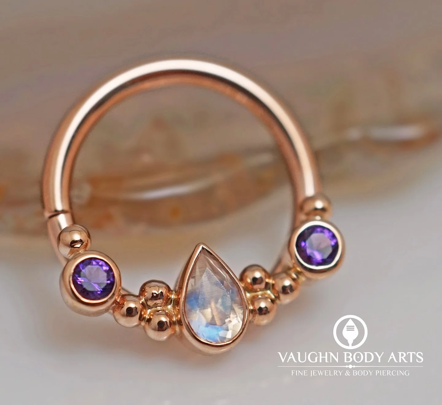 Oh. My. Daith. We love this ring from BVLA! 

This &ldquo;Inside Out Eden Pear&rdquo; is simply gorgeous and would look amazing in a daith, septum, lobe, or cartilage piercing. 

Solid Rose Gold with little tri-beads, genuine amethyst, and a faceted 