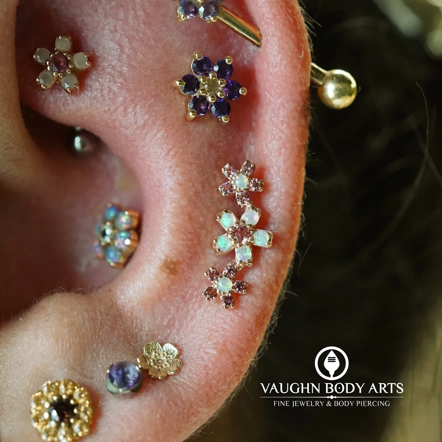 Our awesome client Sharon has a super cute gold/flower theme going on with her ears. 

She&rsquo;s been slowly adding on over the last five years and we just love how it looks. 

She stopped by for a couple new helix piercings and chose a lovely Cher
