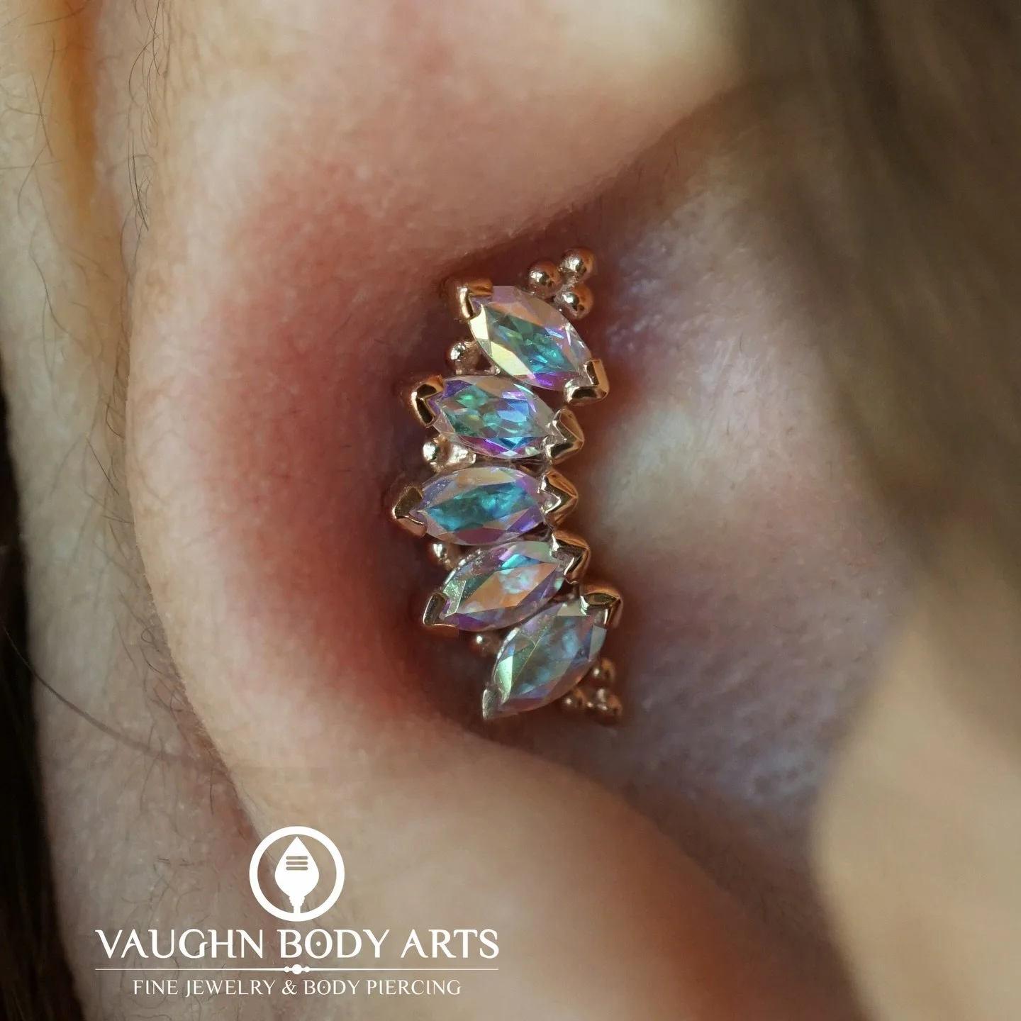 Our wonderful client Melanie stopped by to get pretty new jewelry for some piercings we had done for her 6-7 years ago. 

For her conch, she picked out one of our favorite pieces from BVLA. 

&ldquo;Marquise Panaraya&rdquo; with Mercury Mist Topaz, h