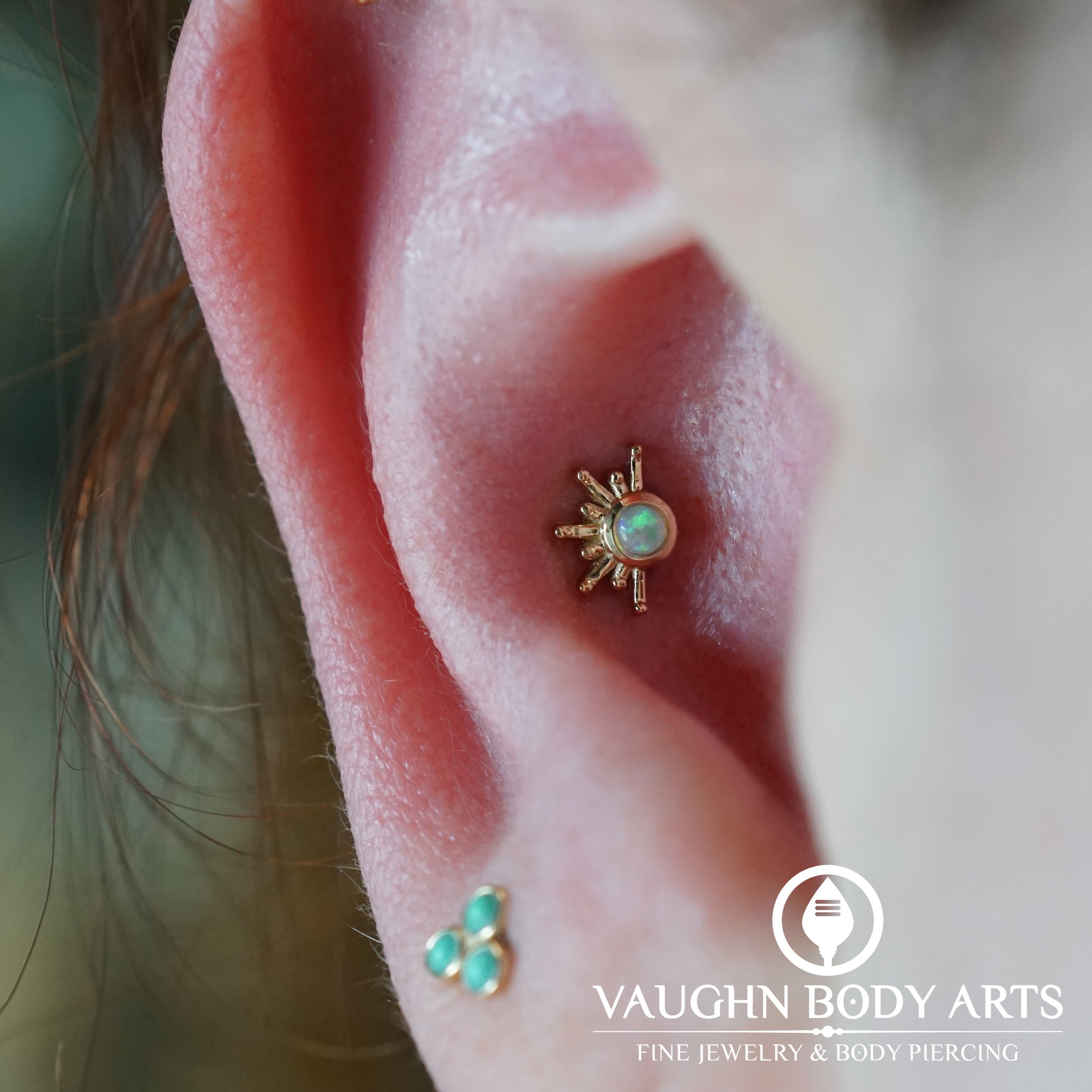 Here is a beautiful conch piercing we got to do for our wonderful client April. 

She picked out one of our favorite pieces for conch piercings. This &ldquo;Live To Tell&rdquo; from BVLA is made of solid Yellow Gold with a Genuine Opal. 

Thank you s