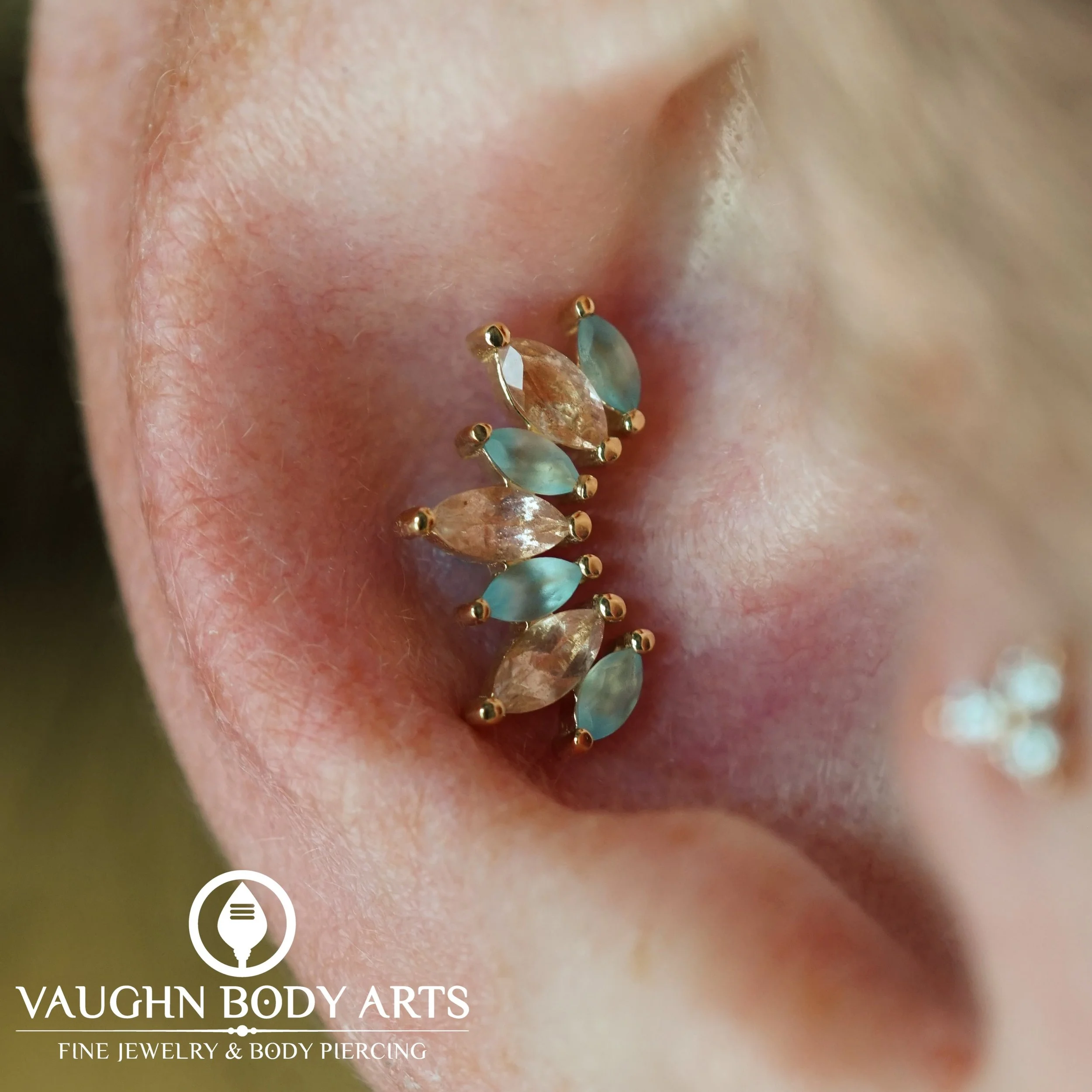 We got to do this conch piercing for Nicole, and it could not look any more gorgeous! 

The &ldquo;Athena&rdquo; from BVLA is a perfect design for conch piercings, and we especially love this gemstone combination. 

Solid Yellow Gold with sandblasted