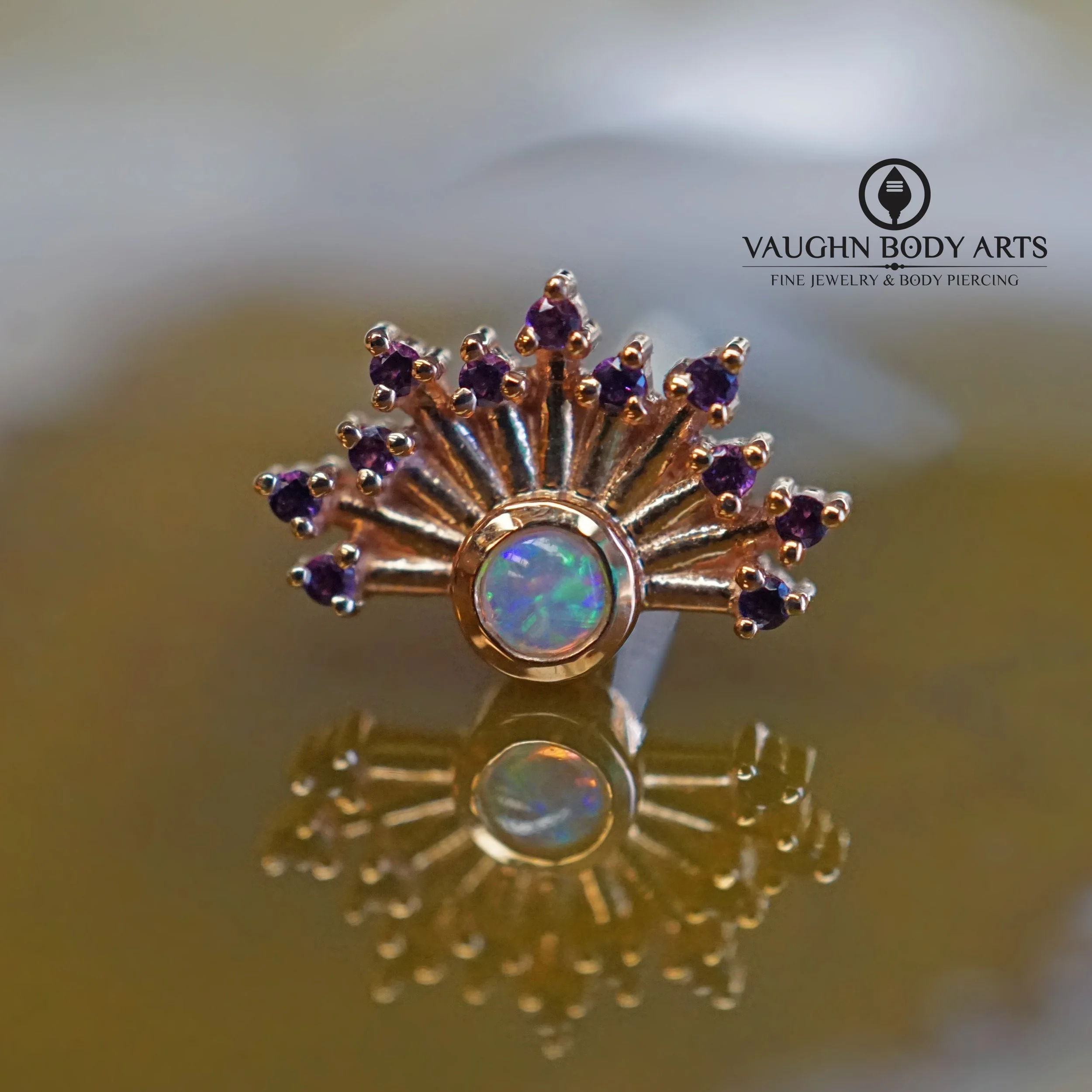 We just love the &ldquo;Twilight&rdquo; from BVLA. 

Designed in collaboration with Robert Pattinson and Kristen Stewart! Okay, we made that part up....

But, it is an absolutely gorgeous piece. Solid Rose Gold with a sunray of little Genuine Amethys