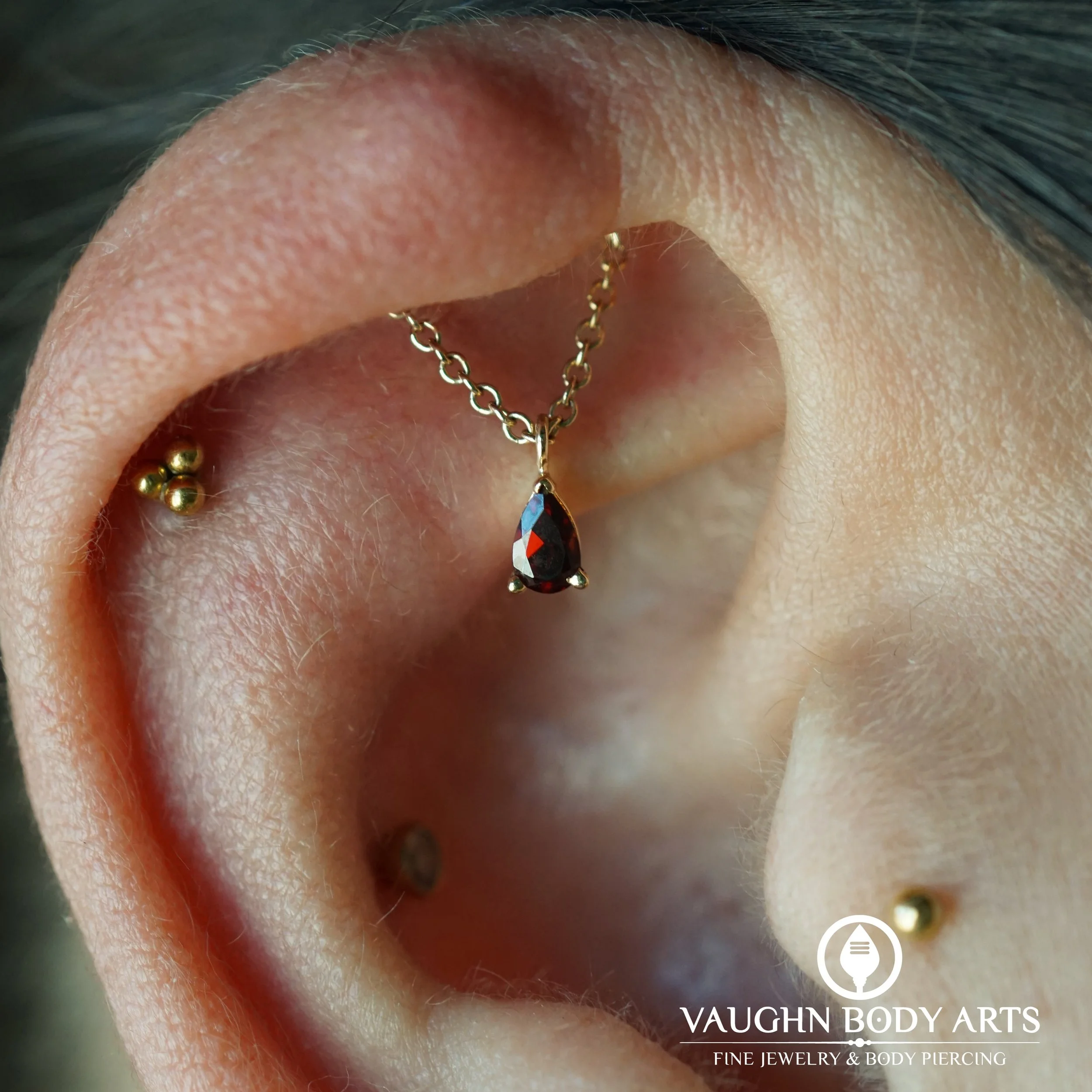 This awesome ear belongs to our client Jessica. 

Vaughn got to do this hidden helix piercing for her, and we are so thrilled with how gorgeous it looks. 

Jessica picked out a lovely &ldquo;Kendall Pear&rdquo; from BVLA. Solid Yellow Gold with a Gen