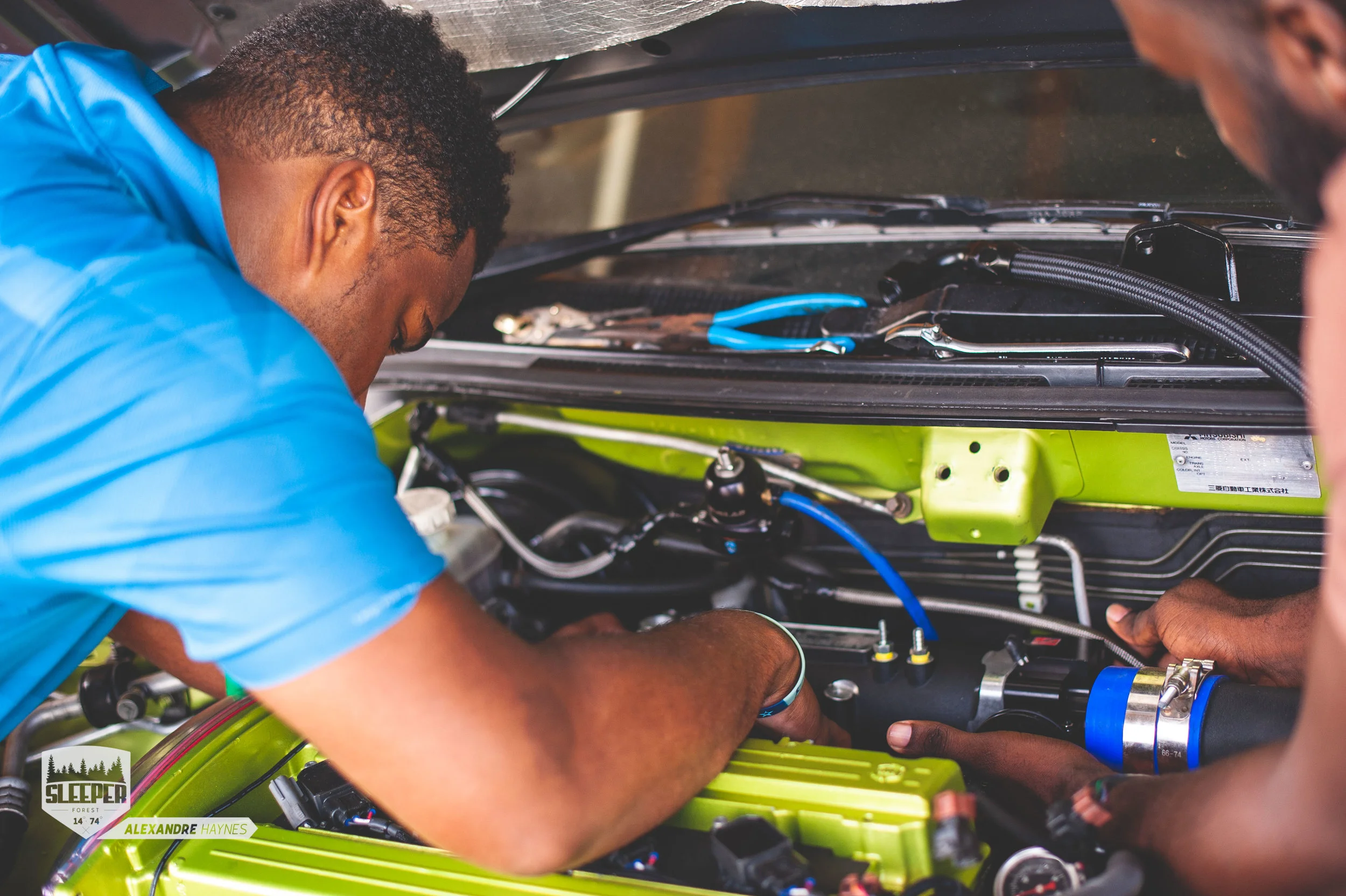 Kyle helps offer up the new manifold.