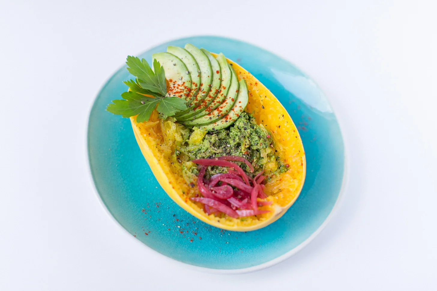 I mixed mine in with a spaghetti squash. Cut squash in half and lie facedown in a casserole dish with 1" or so of water. Bake at 350C for 30-40 minutes. Pull 'spaghetti' with a fork, add pesto and toppings and eat it right out of the skin.