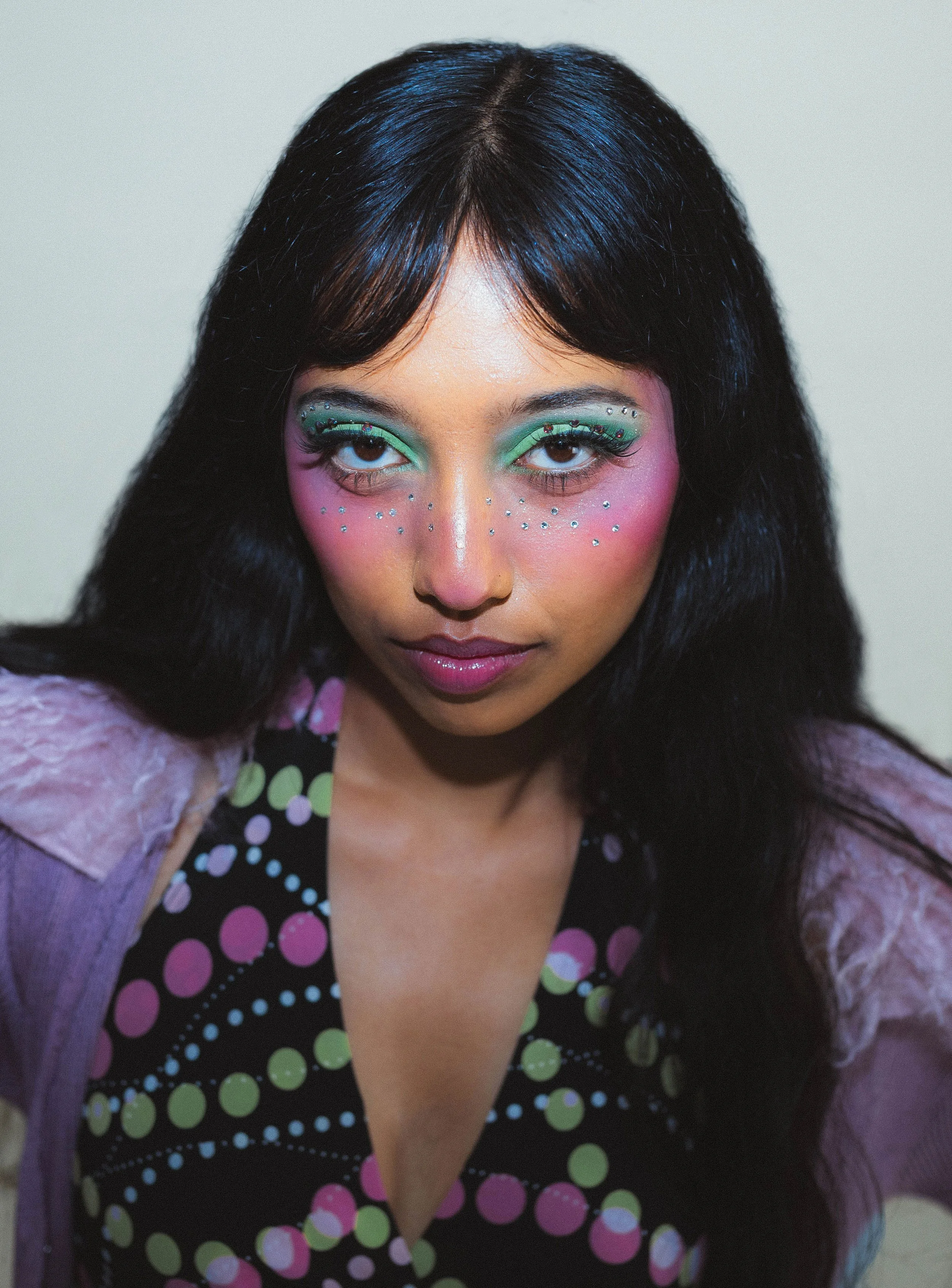 an indian model wearing bright colorful makeup inspired by zara larsson