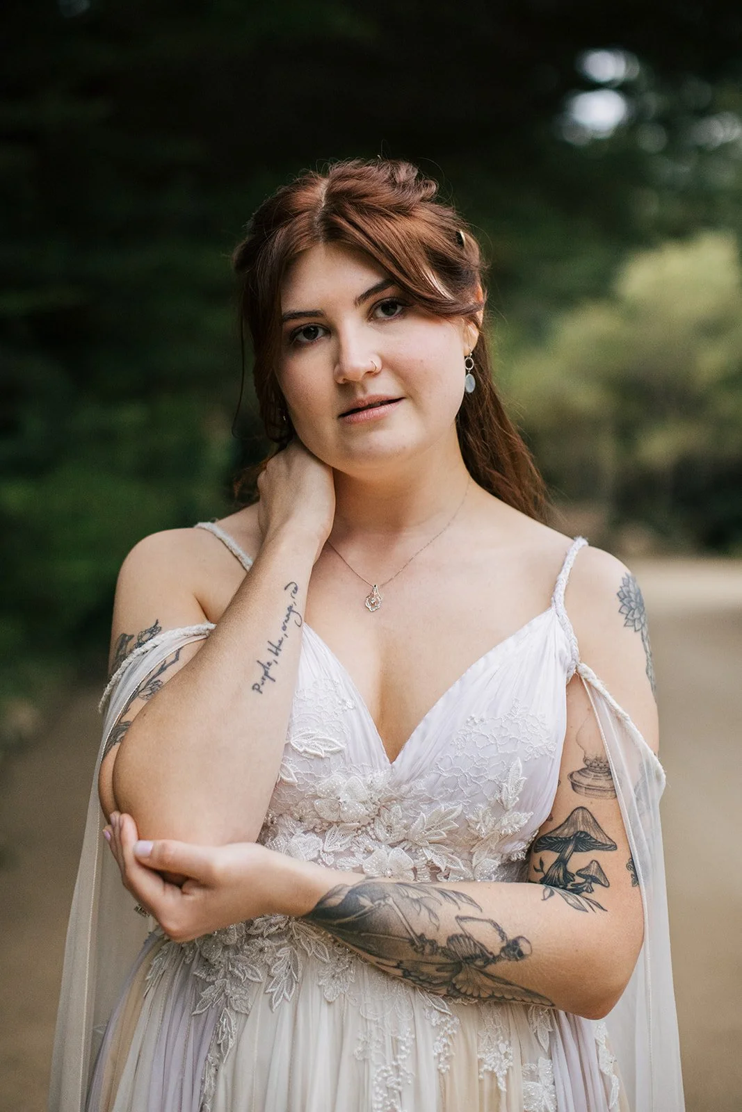 a whimsical bride stands at holly farm in carmel, ca
