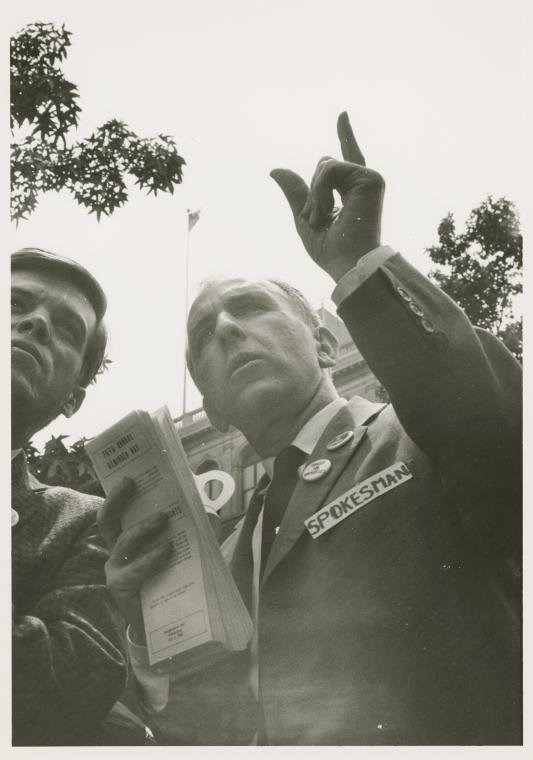    Craig Rodwell, left, and Frank Kameny, right, at the final Reminder Day picket at Independence Hall, Philadelphia, July 4, 1969. Credit: Photo by Kay Tobin Lahusen, courtesy of Manuscripts and Archives Division, The New York Public Library.   