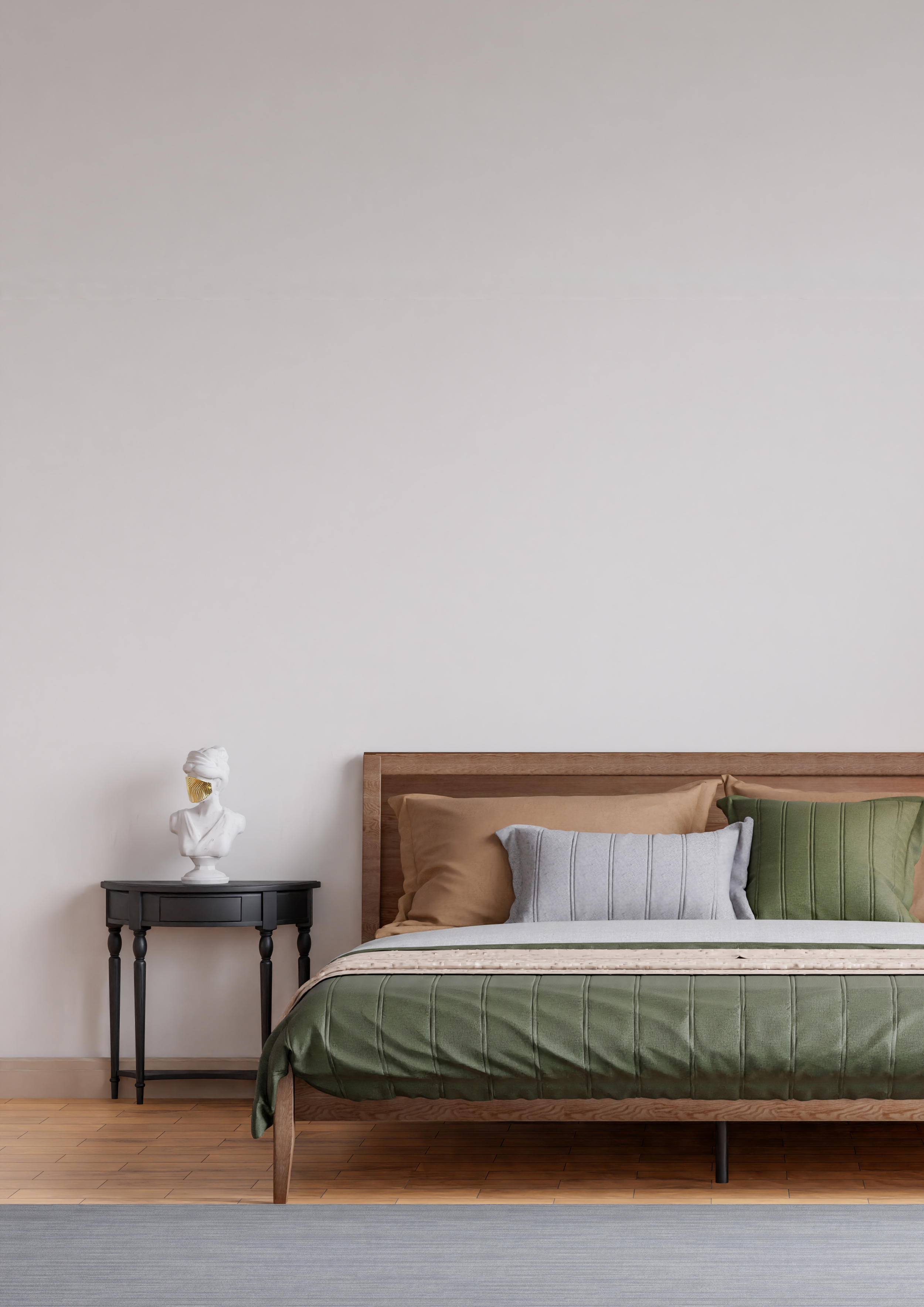 Minimalist bedroom with wooden bed frame, green and neutral bedding, layered pillows, black side table, and decorative white bust sculpture, showcasing Scandinavian-inspired interior design.