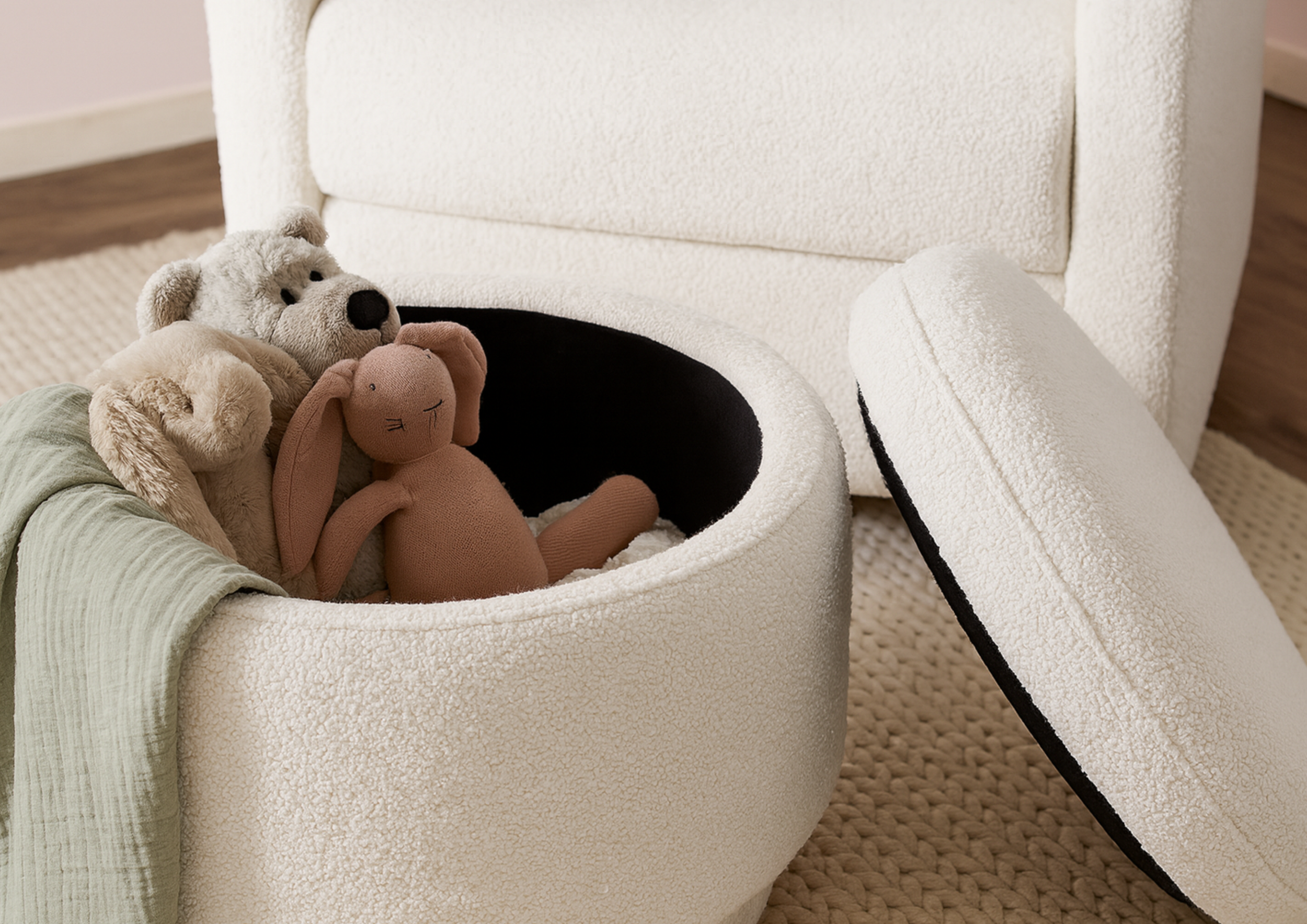 Storage ottoman in boucle fabric filled with plush teddy bears and bunny toy, showcasing functional and stylish furniture for modern nursery and family-friendly home design.