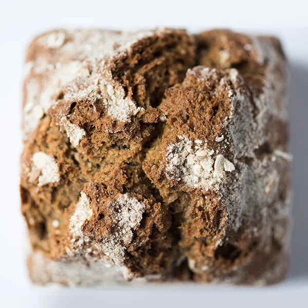 Soda Bread Full flavoured traditional soda bread with a few aded extras. Malted wheat flour, grains, and treacle contribute to sweetness and a large volume of buttermilk from Kappacasein Dairy is added ensuring great depth of flavour and keeping quality. Due to the high level of hydration in the dough it is too wet to shape in the traditional round and is baked in a tin instead.
