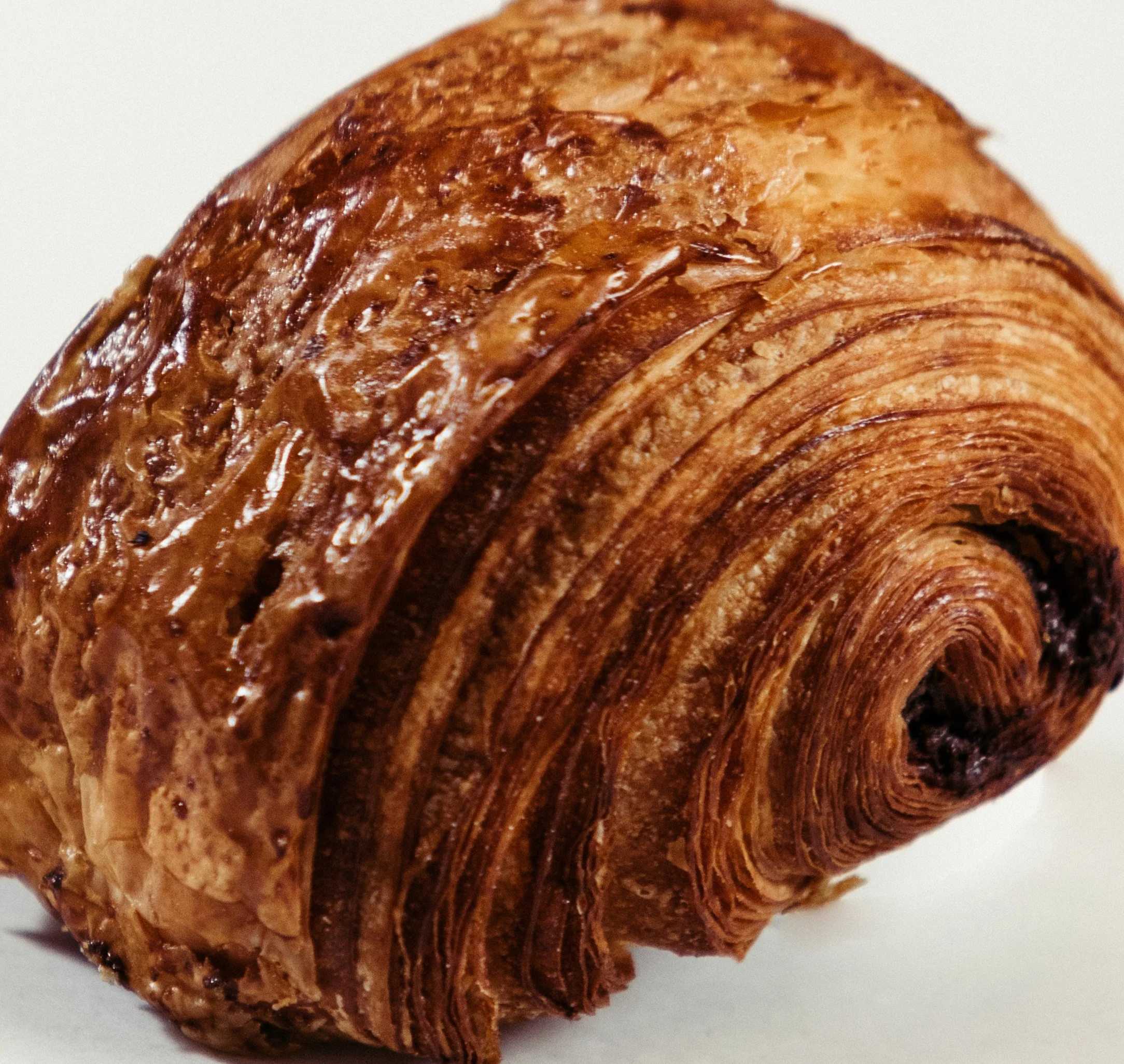 Pain Au Chocolat with the addition of Valrhona chocolate sticks. The best bit is the "snout" that is made when the chocolate melts out of the ends during baking.