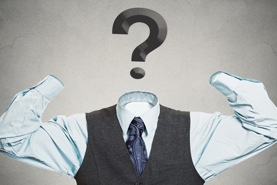 Desperate businessman with question mark instead of head has no hands tools to solve multiple financial issues isolated grey wall background. Corporate problems lack of solutions concept. Hopelessness.jpeg