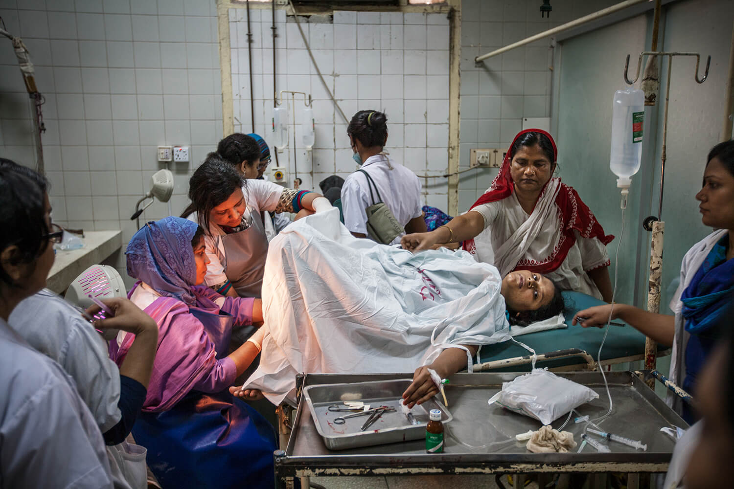 Bangladesh. A woman giving birth to her child at Dhaka Medical Collage Hospital. 