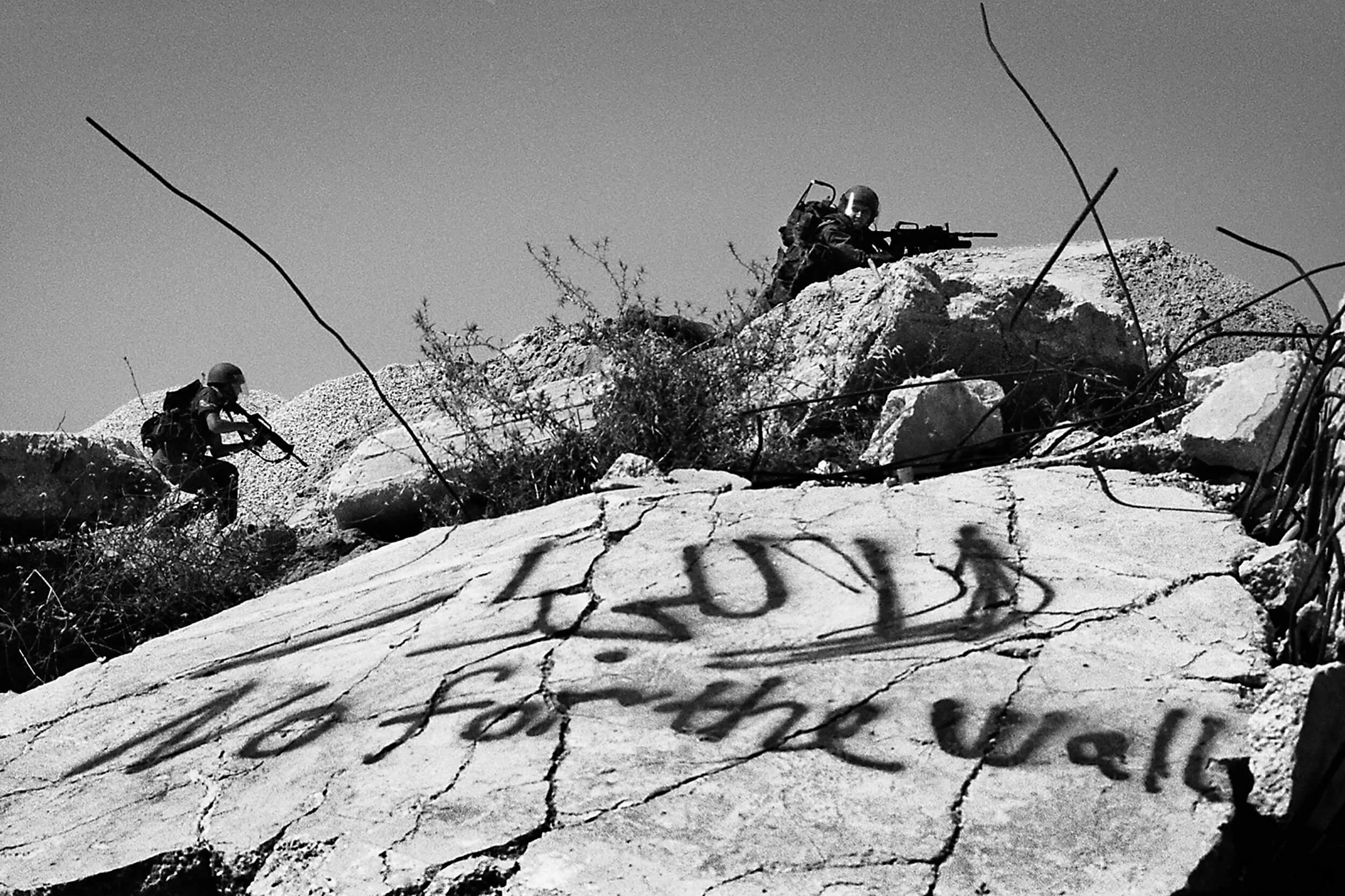 The Israeli army in attack against Israeli and Palestinian demonstrators.