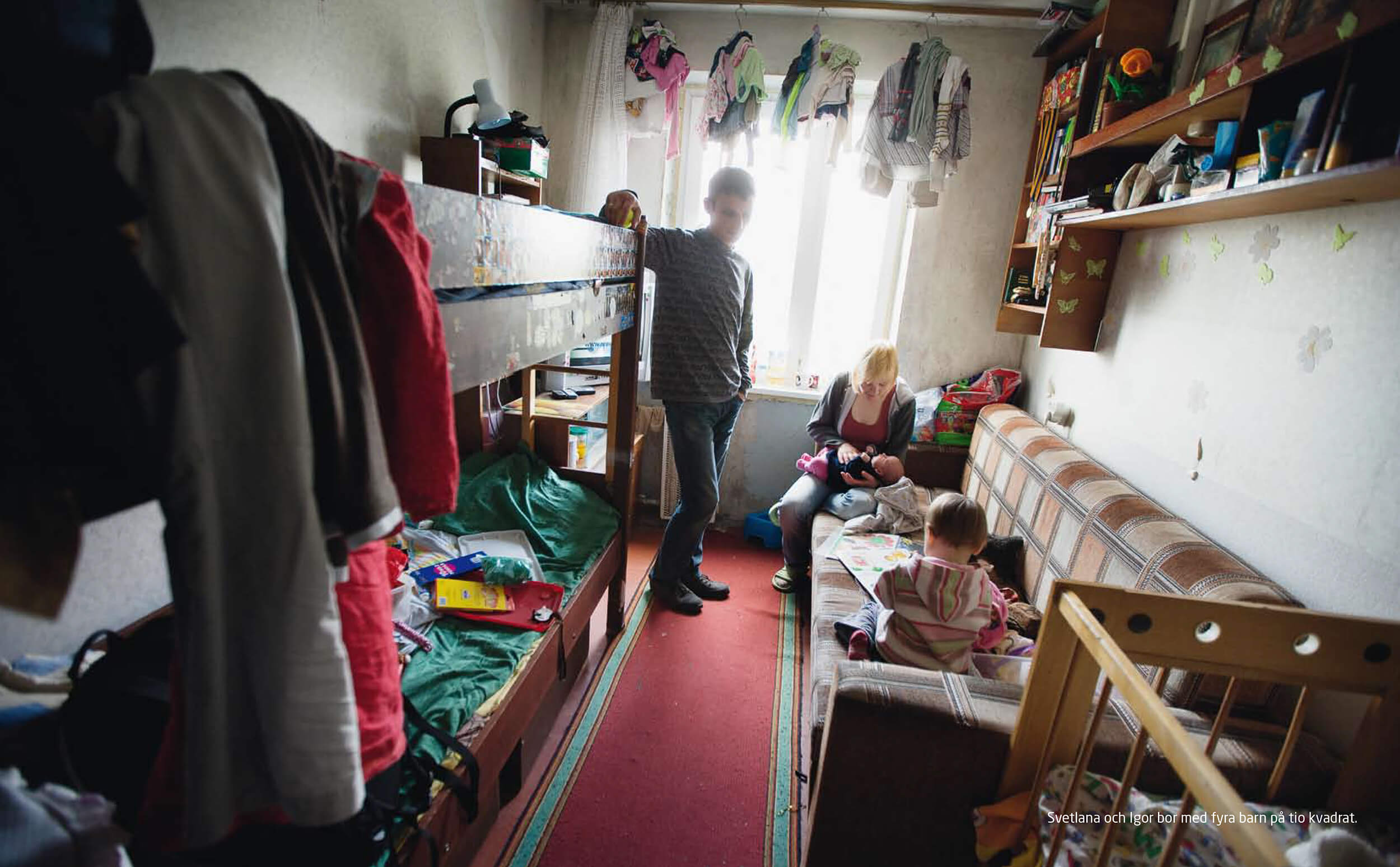  Ukraine. Svetlana, mother of four children has diagnosed HIV, lives with her new man, Igor at ten square meters 