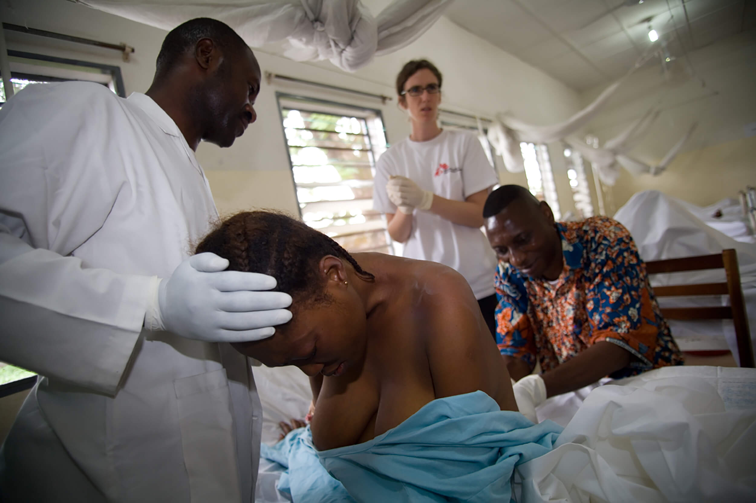 Democratic Republic of Kongo. DRC. A lumbar puncture is performed on an HIV-patient in order to diagnose infections. 