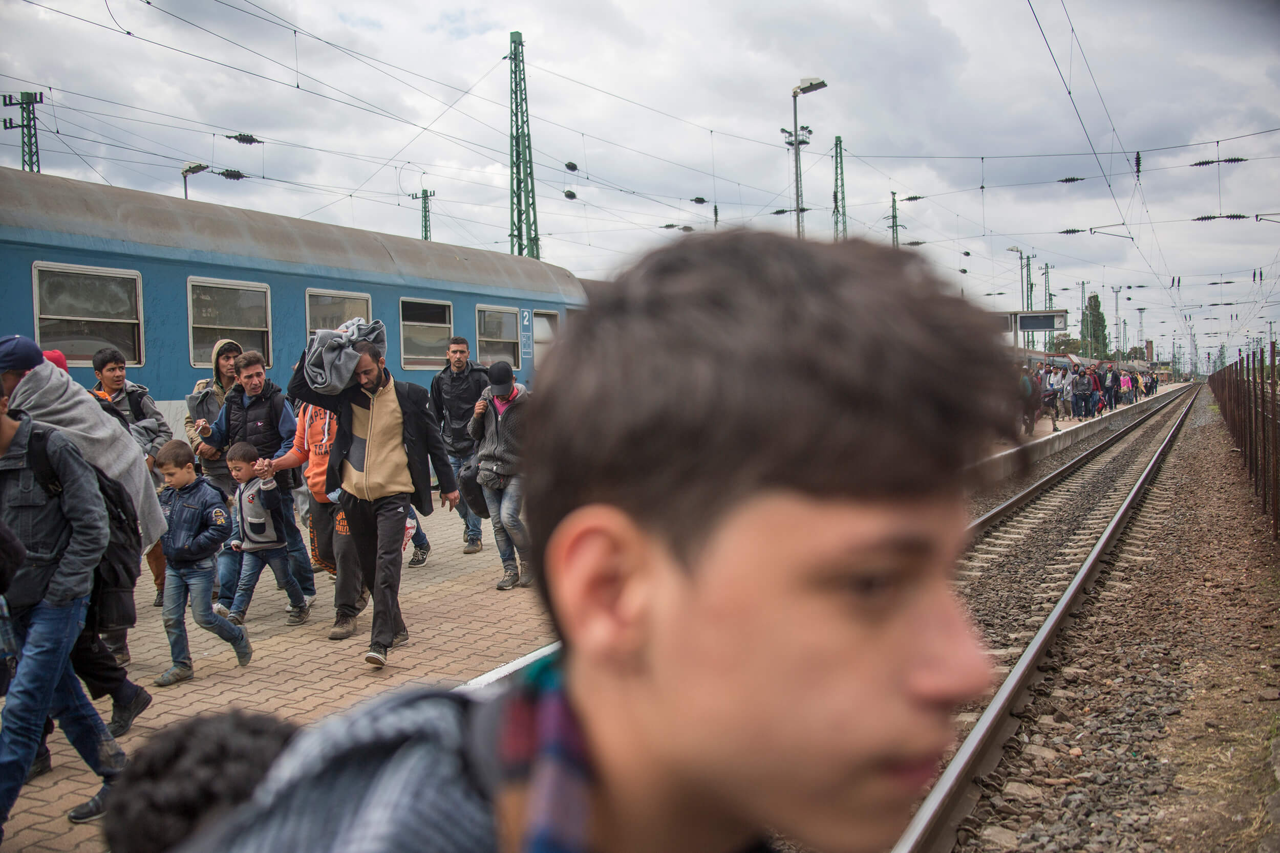  Hungaria. October 2015.Refugees from Syria, Afghanistan and Iraq arrive by train to the Hungarian border station Hegyeshalom, three kilometers walk to the border with Austria, to Nickelsdorf, for further transportation by bus to Vienna. 