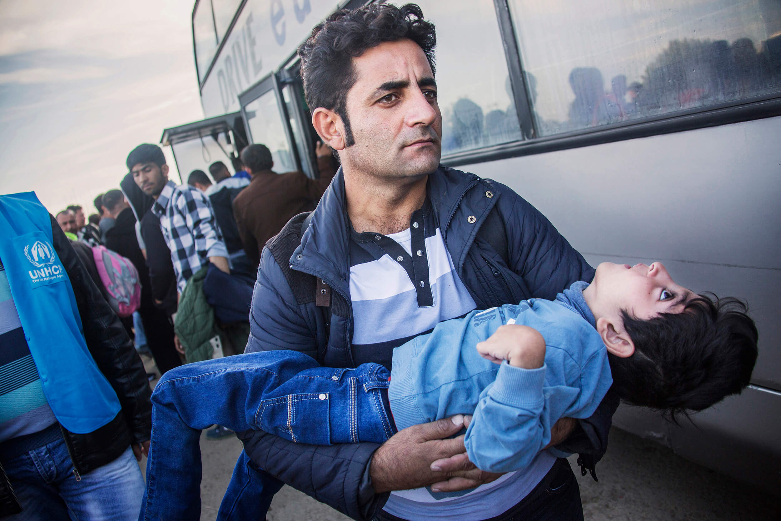  Serbia. October 2015. Refugees arriving by bus to Serbia at the border with Croatia. In the beginning of the crisis mostly young men fled. Now everyone. Old, young, sick, disabled, grandparents, whole families with pregnant women and babies. 
